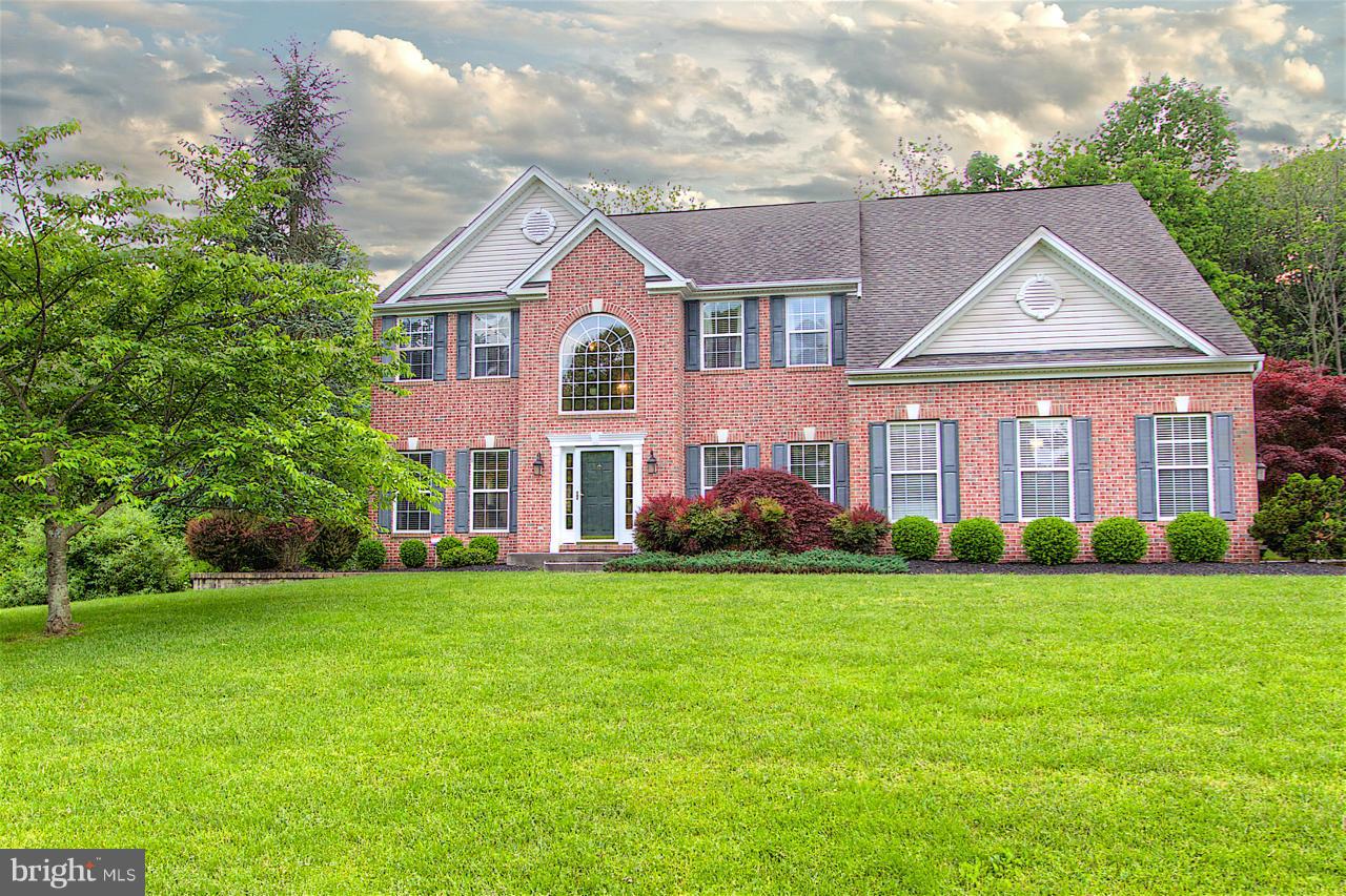 GORGEOUS 5 BR COLONIAL NESTLED  ON NEARLY AN ACRE IN PRIVATE LAKE COMMUNITY OF CAMPUS HILLS ESTATES- GEMCRAFT SALEM MODEL- OPEN FLOOR PLAN W/ 2 STORY FOYER * UPDATED KIT. HAS NEW GRANITE COUNTER TOPS FLOWING ONTO 500 SQ. FT.  COVERED REAR  DECK BACKING TO PRESERVED WOODED  LAND* SECLUDED PRIVATE BACK YARD* 1ST FLR. OFFICE* FAMILY ROOM W/ GAS FIREPLACE*GLEAMING HRWD FLRS  *UPDATED SUPER MASTER BATH