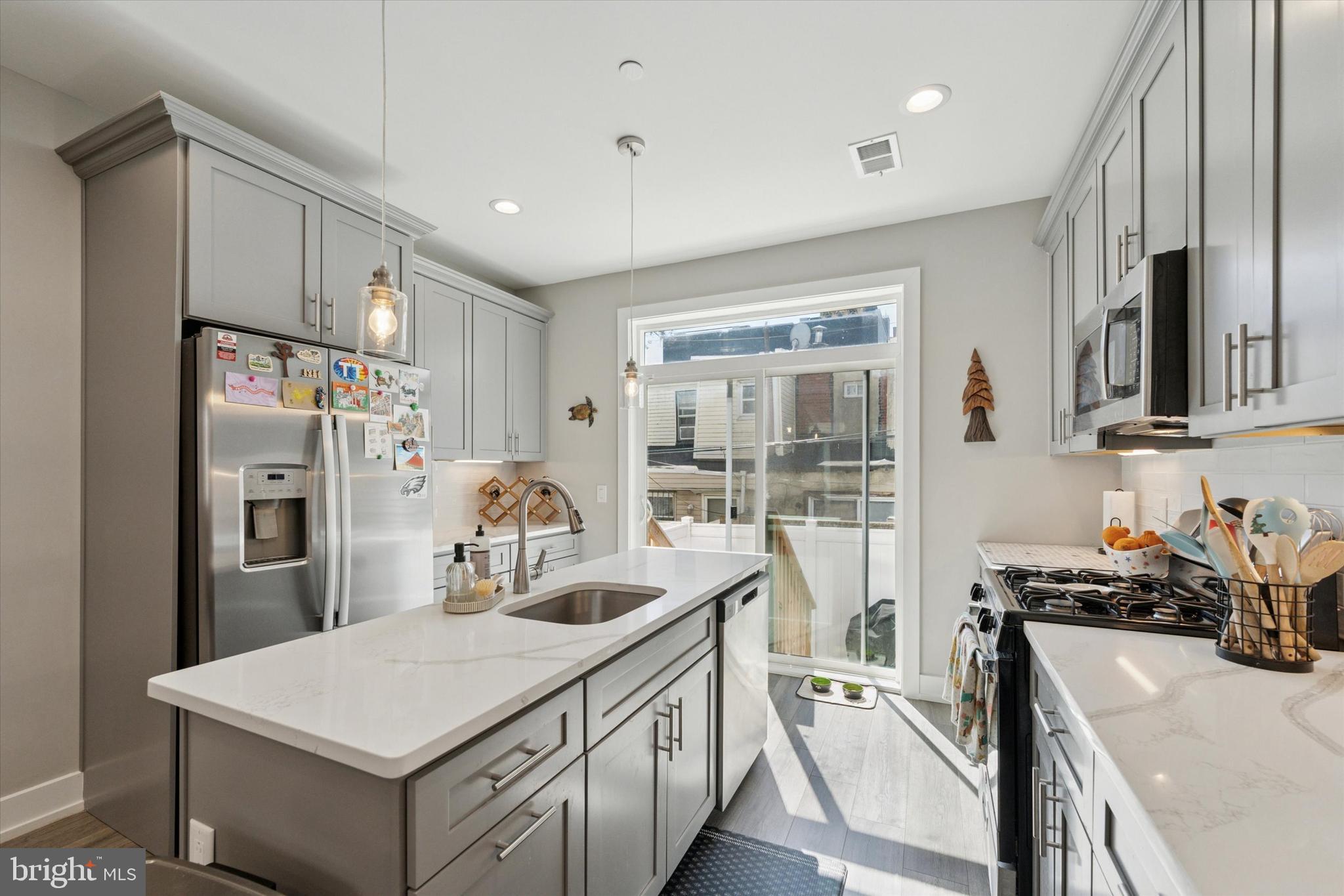 Welcome to this stunning 4-bedroom, 3-bathroom home in the heart of the Lower Moyamensing neighborhood in South Philly! Flooded with natural light from the multiple extra-large windows, this expansive home offers a perfect blend of style, comfort, and functionality.

Step inside to find an open-concept living and dining area, leading to a modern kitchen with sleek finishes. The fully finished basement provides additional living space—ideal for a home office, gym, or entertainment area. Upstairs, spacious bedrooms with ample closet space ensure comfort for all.

The real highlight? A private roof deck offering breathtaking city views—perfect for relaxing or entertaining! With three full bathrooms and a prime location near shops, & restaurants, this home is a rare rental find!