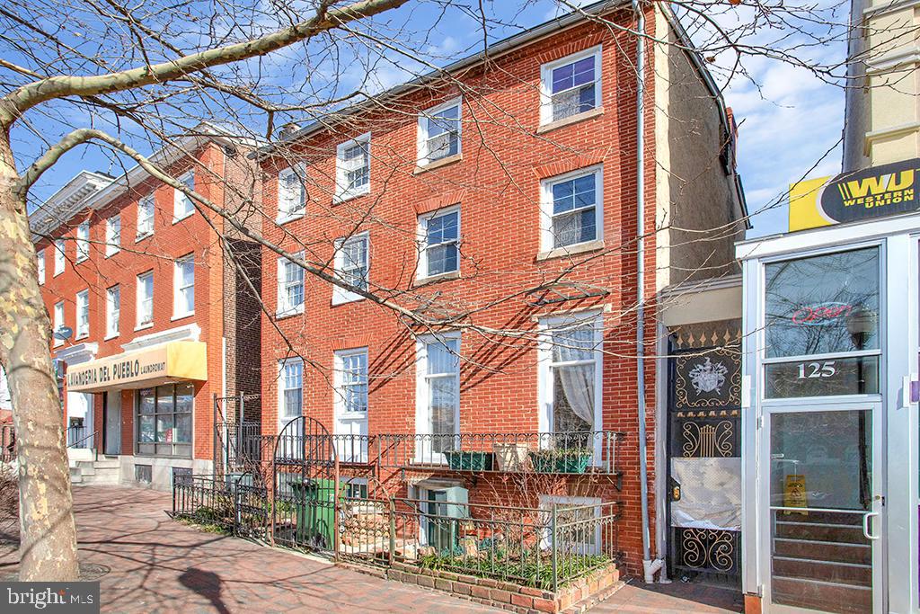 COMPLETE RENOVATION in 2025 with additional updates in January 2026! This stunning four-level Fells Point masterpiece may qualify for first-time buyer credits and grants (subject to borrower eligibility).

Step inside and experience the elegance of the Gilded Age seamlessly blended with modern luxury. The fully renovated lower level offers exceptional flexibility, featuring a full bath with a luxurious walk-in shower, laundry area, utility space, and abundant storage. With a separate, gated street-level entrance, this level is ideal for guests, extended living, or added convenience.

The main level—also accessible via a separate entrance—continues the charm with a gourmet kitchen showcasing two-toned cabinetry and high-end appliances, perfect for culinary enthusiasts. The living area is complemented by a stylish powder room and opens to a brand-new deck overlooking a backyard ready for your gardening or entertaining vision.

The second level hosts a sprawling primary suite with raised ceilings, a skylight, walk-in closet, additional hallway storage, and a private full bath. Step out onto the second deck to enjoy morning coffee or evening cocktails in a serene setting.

The upper level features two additional generously sized bedrooms, offering ample space for family, guests, or a home office.

Live like royalty in this rare Fells Point gem where every detail has been thoughtfully designed to elevate your lifestyle. Don’t miss your opportunity to own a beautifully reimagined piece of history—schedule your private showing today!