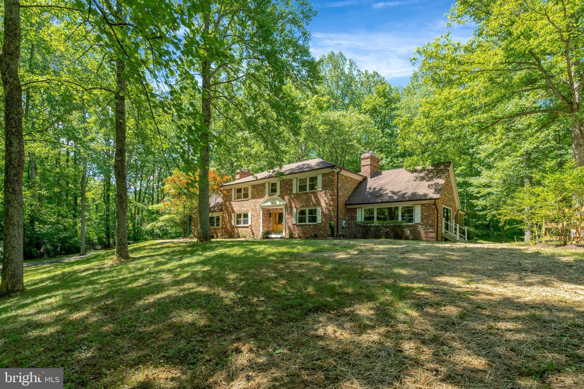 Welcome to 7807 Willowbrook Road – A Show-Stopping Fairfax Station Retreat!

Prepare to be wowed by this one-of-a-kind residence offering over 6,000 square feet of completely renovated living space nestled on an exceptional lot with treehouse-like views from every window. Thoughtfully redesigned from top to bottom, this home blends modern luxury with timeless charm in one of Fairfax Station's most desirable neighborhoods.

The heart of the home is the gourmet kitchen, featuring elegant two-tone cabinetry, gleaming quartz countertops, a dramatic oversized island, and high-end KitchenAid appliances—a dream space for cooking and entertaining. Flow seamlessly into the expansive great room, where soaring vaulted ceilings, exposed wood beams, and a wall of windows create a warm and inviting ambiance. From here, step out to the screened-in porch and soak in the view of your private backyard oasis complete with a sparkling in-ground pool, custom gazebo, and lush landscaping—perfect for summer gatherings or quiet moments of serenity.

Upstairs, the renovated primary suite offers a peaceful retreat with its own sitting room or office, walk-in closet, and a spa-inspired en-suite bathroom with double vanity, soaking tub, and frameless glass shower. Three additional generously sized bedrooms include a junior suite with a private bath, and two others connected by a Jack-and-Jill bathroom, all offering abundant space and natural light.

The fully finished lower level is an entertainer’s dream, featuring a media room, wet bar area, full bathroom, and a private den ideal for guests, home gym, or playroom. Ample storage throughout ensures everything has its place.

Additional highlights include; New Garage Doors on the Oversized 2-Car Garage, New Windows and Sliding Glass Doors Throughout, Newer Architectural Style Roof.

Set on a picturesque, tree-framed lot in an established community, this home offers the peace and privacy of a wooded retreat, yet is just minutes from major commuter routes, shopping, dining, Burke Lake Park, and top-rated schools.