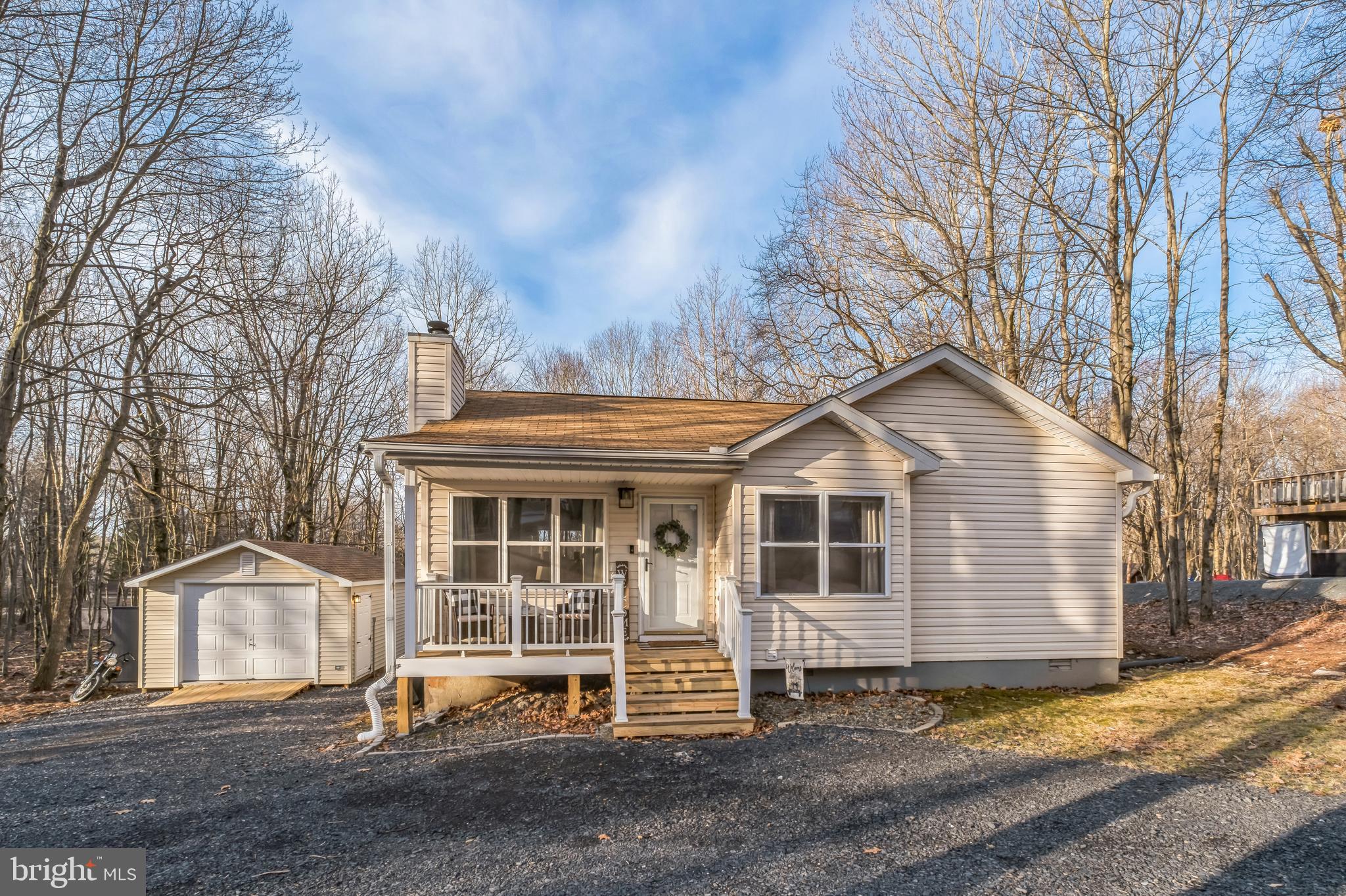 Tucked away in the scenic Briar Crest Woods community, 122 Oak Place is a beautifully updated 2-
bedroom, 2-bathroom ranch offering the perfect mix of modern comfort and natural charm. Sitting on a 
private 0.45-acre wooded lot, this home provides a peaceful retreat while keeping you close to local 
attractions.  Step inside to an open floor plan with cathedral ceilings, creating a bright and airy atmosphere. The cozy living room features a charming brick wood-burning fireplace, ideal for relaxing evenings. The modern kitchen is designed for both style and function, boasting granite countertops, stainless steel appliances, a tiled backsplash, and ample cabinet space.  Outdoor living is just as inviting! Both the front and back decks have been newly replaced, offering the perfect space to relax or entertain. The brand-new garage, fully equipped with electric and climate control, provides a versatile space for storage, a workshop, or even a home gym. In the backyard, a fire pit sets the scene for memorable evenings under the stars. As a resident of Briar Crest Woods, you'll have access to fantastic community amenities, including a pristine lake, sandy beach, clubhouse, and tennis courts. Plus, you’re just minutes from shopping, dining, and outdoor adventures like hiking, skiing, and water parks. 

Whether you’re looking for a full-time home or a weekend retreat, 122 Oak Place offers the perfect 
blend of comfort, convenience, and nature. Don’t miss this incredible opportunity!