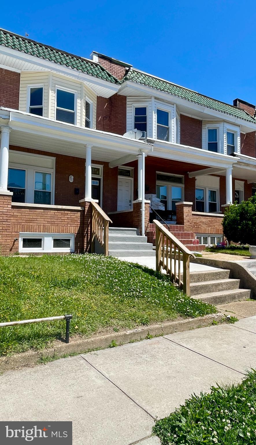 Discover the perfect blend of style and comfort in this recently renovated townhouse located in highly desirable West Baltimore. This three-bedroom, two-bathroom rowhome perfectly blends modern amenities with classic charm. The interior features a neutral color palette with hardwood floors and new carpeting throughout. The main level offers a spacious living and dining area alongside an updated eat-in kitchen equipped with stainless steel appliances and granite countertops. Upstairs, a skylight illuminates the hallway leading to three bedrooms and a full bathroom. The lower level provides an open living space, a second full bathroom, a utility room, and extra storage, with a walk-out for easy access. Outside, the fenced rear yard is ideal for relaxing or entertaining. The property is conveniently located near shopping, hospitals, schools, restaurants, and downtown. This move-in-ready home is a must-see!