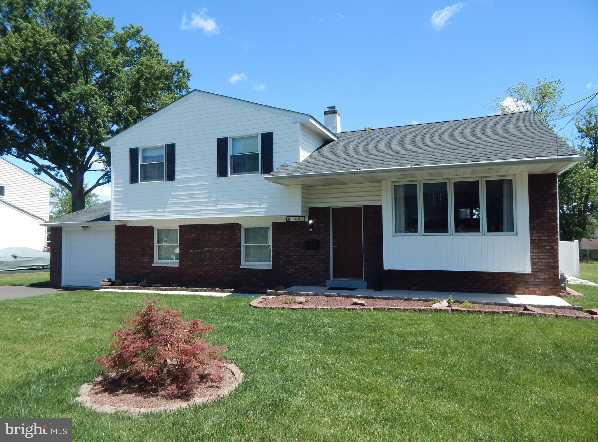 Nestled in charming Willow Manor Farms, this delightful split-level home offers a perfect blend of comfort and functionality. With three spacious bedrooms and one and a half bathrooms, this residence is designed to meet your everyday needs while providing a warm and inviting atmosphere. Step inside to discover a living room, formal dining room, and a large addition/ family room that connects to the kitchen, making it an ideal space for gatherings. Recessed lighting and ceiling fans throughout enhance the ambiance, creating a cozy environment for relaxation. The lower level features a welcoming fireplace, perfect for chilly evenings, inviting you to unwind with a good book or enjoy quality time with loved ones.  There is a home office with a large storage closet that could be converted to a fourth bedroom, a half bath and a laundry area.    The unfinished basement offers tons of additional storage space. Outside, the property boasts a large fenced in yard with a patio, providing ample room for outdoor activities or gardening. The attached garage and driveway accommodate multiple vehicles, ensuring convenience for you and your guests. This updated and expanded home, combines classic charm with modern potential, making it a wonderful opportunity for those seeking a place to create lasting memories. Experience the warmth and comfort of this inviting residence, where every corner feels like home.