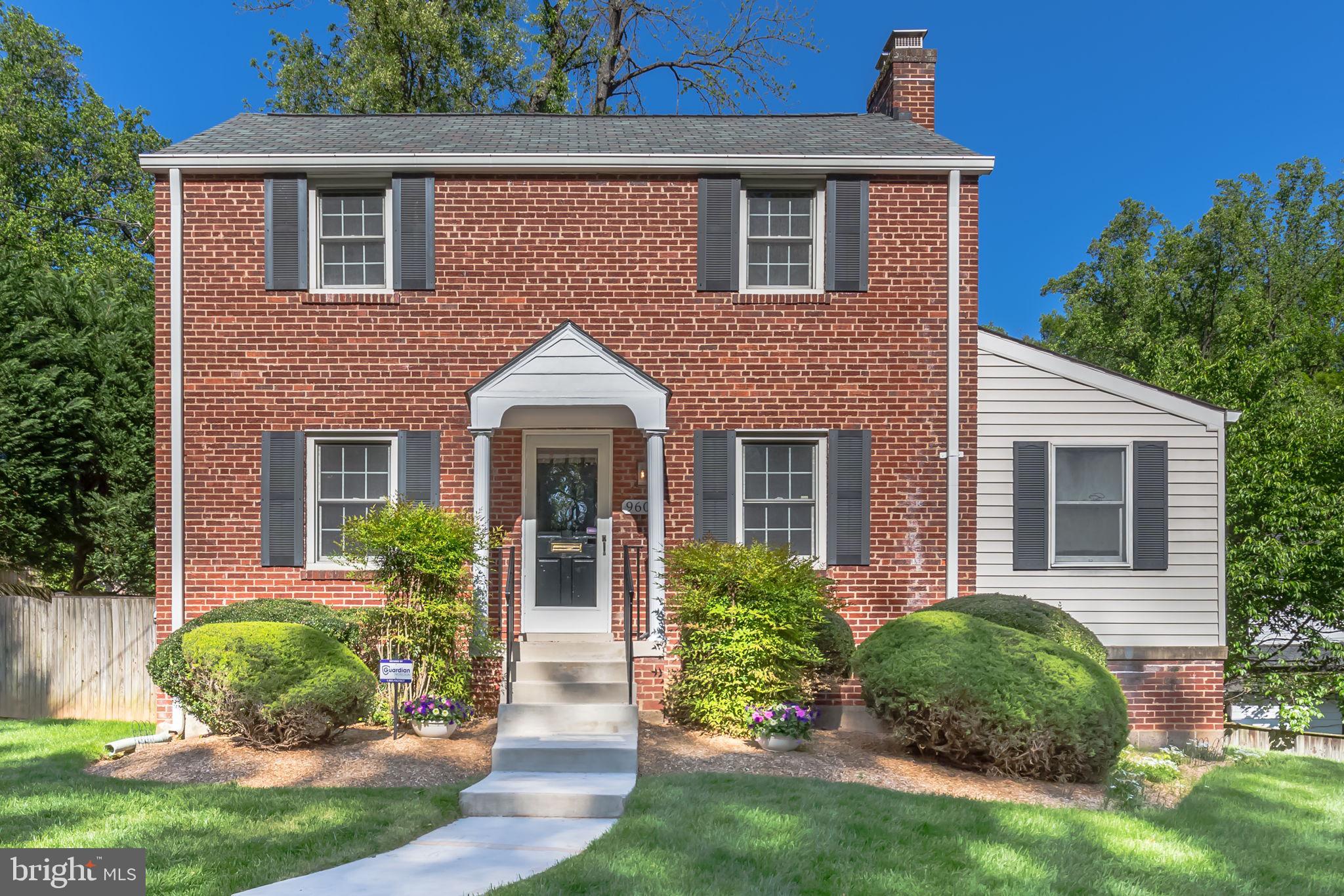 Move-In Ready Gem in Sought-After Parkwood! This sun-drenched, beautifully updated Colonial blends timeless charm with modern touches and upgrades. This home offers comfort, space, and style, featuring 3 bedrooms, 2 full baths, a bright sunroom addition, and a finished lower level. The updated kitchen boasts new cabinetry and hardware, granite countertops, and stainless steel appliances. Both bathrooms have been updated, including a stylish lower-level bath with a newly tiled shower, modern vanity, and contemporary fixtures. Hardwood floors flow throughout the main level, freshly painted, new carpet in the sunroom, updated lighting, and ceiling fans that enhance both style and function. Step outside to a large Trex deck—ideal for entertaining or quiet mornings—overlooking a professionally landscaped, private backyard. Major systems update in 2018 - roof, HVAC, windows etc. A two-car driveway adds everyday convenience. All this in a prime Parkwood location—just minutes from parks, trails, Metro, major commuter routes, downtown Bethesda, top-rated schools, and more!