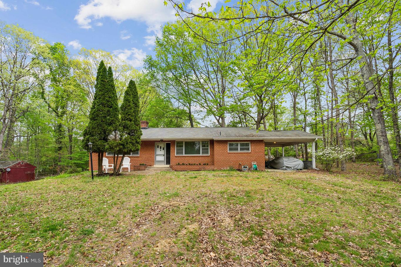 All offers requested by Wednesday, April 30th at 1pm. Opportunity knocks with this nature-lover’s retreat at 1617 Accokeek Rd West. Why drive hours to escape the city when your personal sanctuary is just 18 miles from Capitol Hill? Tucked away on nearly 10 acres of lush, AR-zoned land, 1617 Accokeek Rd West offers a rare opportunity to reconnect with nature—without leaving behind the convenience of the city.

This property features a mid-century modern ranch-style home. Originally a modified “Riviera” model from the “Homes of Color” collection by DC-based Standard Homes Co., this home was thoughtfully designed to harmonize with the natural landscape. Inside, you'll find three bedrooms, including a primary suite, a bright kitchen, a spacious living room with fireplace, and a full basement with additional living space and storage.

But the true magic of 1617 Accokeek lies outside. Wake up to birdsong, watch deer wander past your window, and spot eagles soaring overhead. This is a haven for stargazers, nature photographers, and anyone seeking peace and inspiration. Whether you envision a modernized renovation, a full rebuild, or even a rustic Airbnb, the possibilities here are as expansive as the acreage.

Ideal for small-scale farming, nature-based retreats, or simply those who crave wide-open skies, this land invites you to dream big and live gently. Local highlights include boutique stables, organic farms, and the nearby Moyaone Community Pool—plus kayak access and trails in Piscataway Park just around the corner.

1617 Accokeek Rd West isn’t just a property—it’s a lifestyle. A chance to create your own retreat, minutes from the District, and miles from the ordinary.