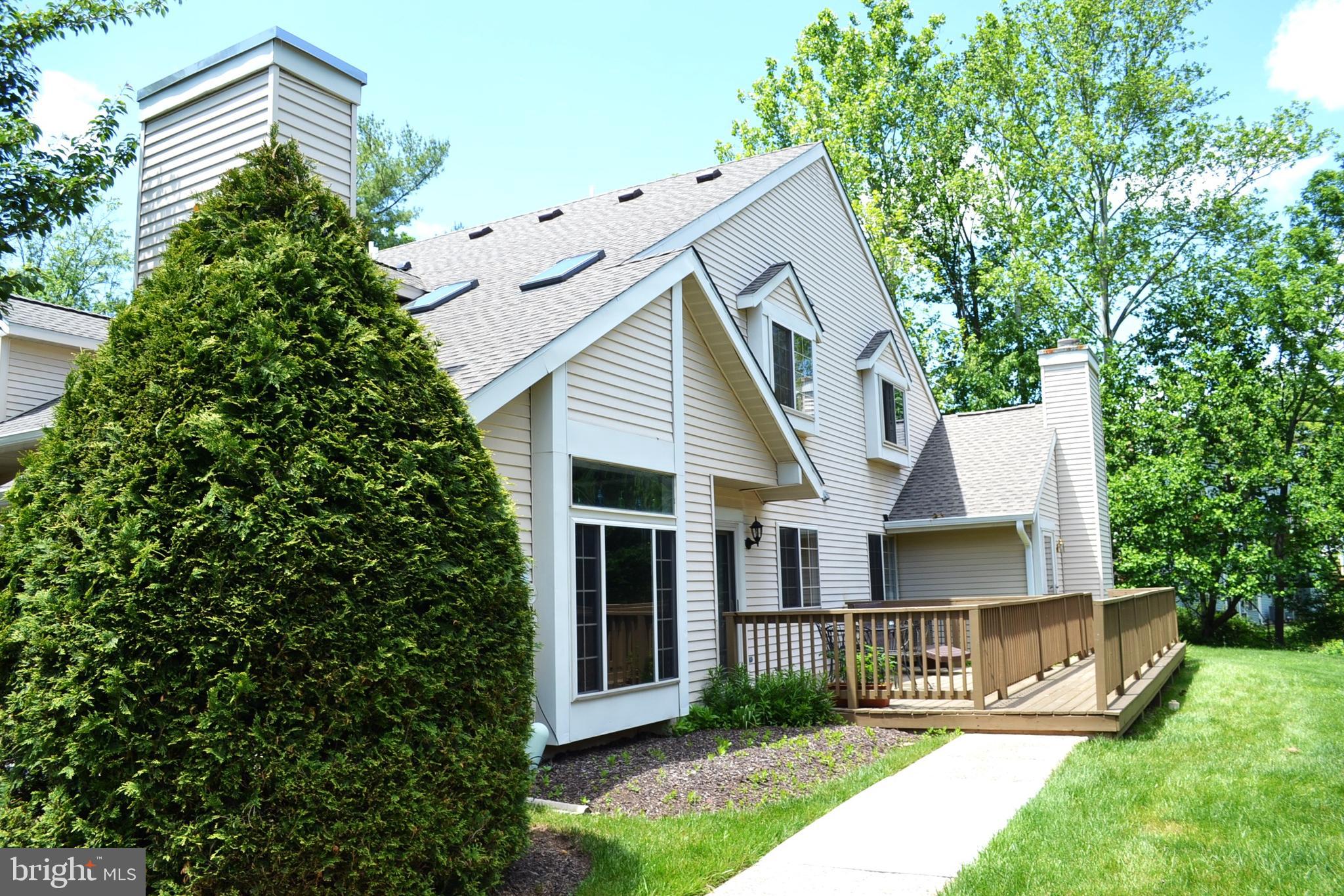 Welcome to your new sanctuary located in the Brookwood Condo Community! This 2 bedroom, 2 full bath contenporaty 2 story condo is located in serenity!  It features a 2 story first floor with floor to ceiling stone fireplace, dining area with sliding doors to the private deck, kitchen with adjoining laundry area, bedroom and full bath.  The second level has a loft overlooking the dramatic great room and additional large bedroom with another full bath.  Recent improvements included a newer heater with central air, newer water heater and designer painting throuhout the first floor.  The house is in need of updating but priced accordingly, the seller prefers to sell in "As Is" condition.  The association fee of $350 per month includes exterior maintenance, landscaping, snow removal and trash.  The location can't be beat, it is a rear facing unit backing to woods but yet only minutes to shopping, transportation and major highways.