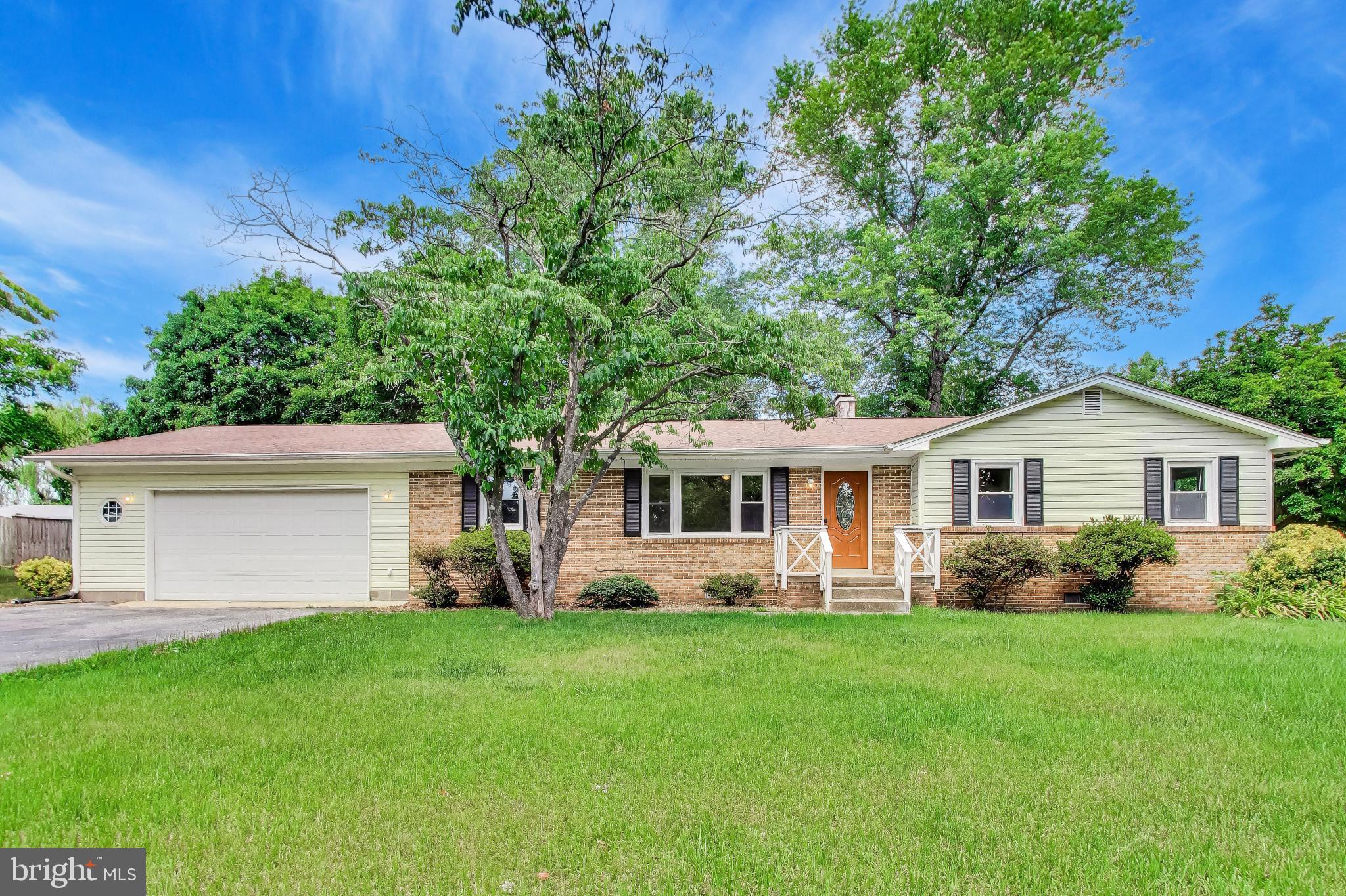 Welcome to one-level living in the heart of California! This 3 bedroom, 2 bathroom home is ready for its next owner. Step inside to find newer luxury vinyl plank flooring, a large living room and an eat-in kitchen that leads to a large recreation room with a wood-burning fireplace. Down the hall are two good size bedrooms and a guest bathroom, along with a primary bedroom with an ensuite bathroom. Outside find a large attached garage, a fenced-in yard with a large deck, all on a half-acre lot. The kitchen, primary bathroom, and HVAC were updated in 2022 and the carpet was replaced and the whole house was re-painted in 2026. Close to shopping, restaurants, and schools, this home is a commuter’s dream offering easy access to major commuter routes into Washington, D.C. and northern Virginia. Schedule your showing today.