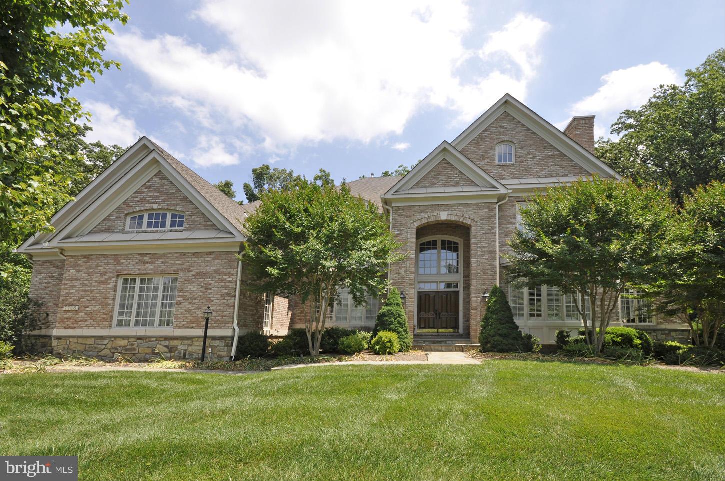 Elegant colonial on 1.3 private acres at the end of a quiet cul-de-sac. Light-filled home with 2-story foyer, formal dining and living rooms, gourmet kitchen w/ island that opens to family room, luxurious master with en suite bath and dual walk-in closets. Walkout lower level with recreation room, wet bar, exercise room, additional bedroom & storage.