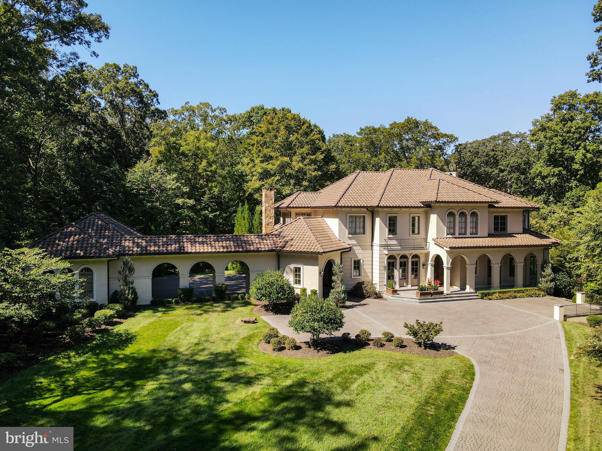Custom home  in McLean's prestigious Turkey Run Road. Ample driveway with manicured grounds including a 3-car Garage, Car Port, Screened-in Porch with fireplace, Fire Pit and Pool with deck jets. Impeccable interiors with 12 ft. ceilings, hardwood floors, Main Level Master, Kitchen with top-of- the-line appliances, custom cabinets and Butler's Pantry. A two-story Family Room with a wall of windoews provide for scenic views and is adorned with a fireplace and French doors to the patio. One-of-a-kind two-story Library that is surrounded by windows has a cozy fireplace and spiral stair case. Also on the Main Level there is a private bedroom with generous sized walk-in Closet and Bath. The Upper Level boasts two en-suites and the Master Suite with fireplace, balcony over-looking the Backyard & Pool, Walk-in Closet and an exquisite Bath with steam shower and hot air bubble tub. A walk-out Lower Level Recreation Room is a dream with a theater, state-of-the-art Wine Cellar and Wet Bar, Fitness Room and Bedroom with bath.
