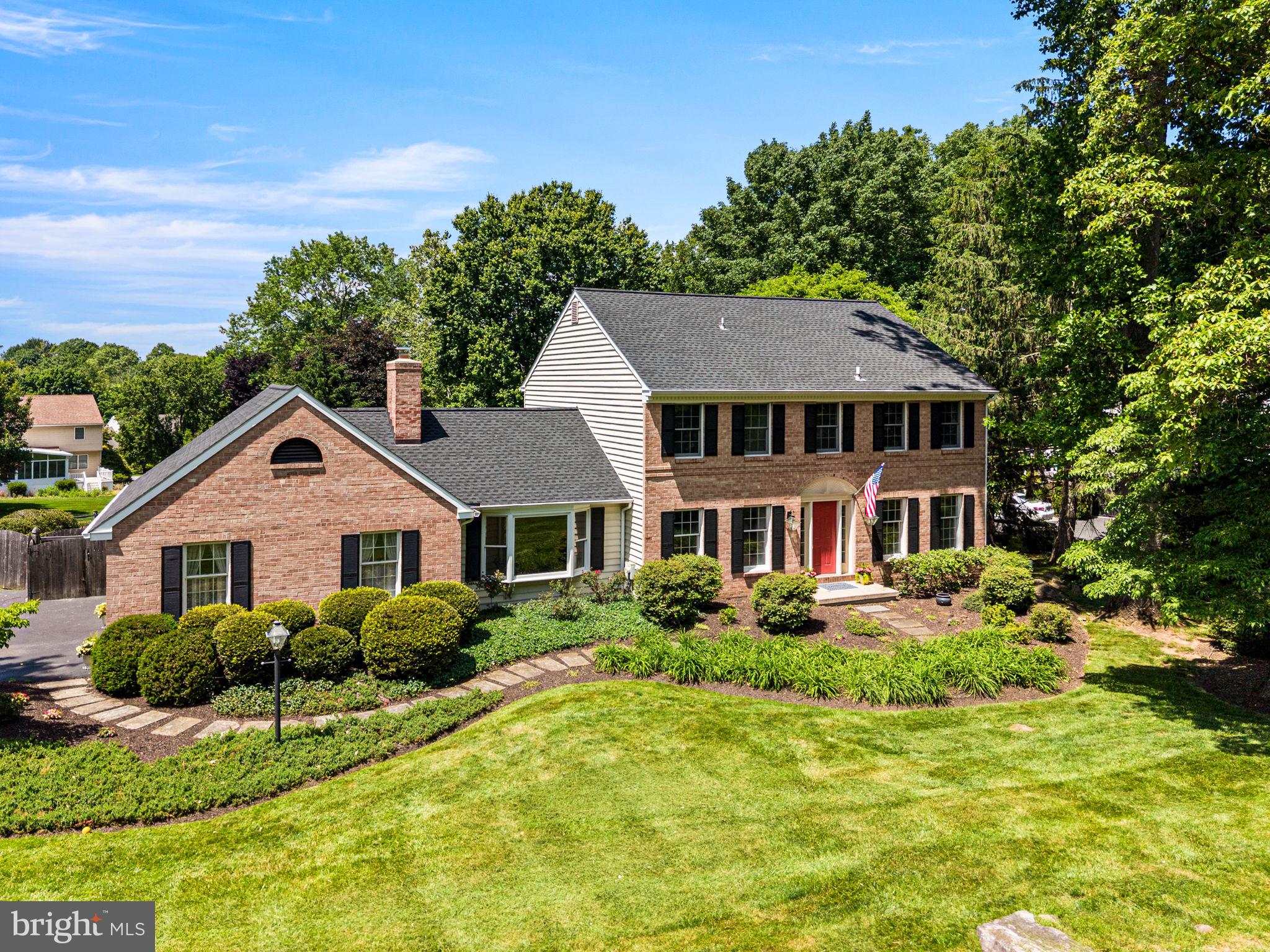 Welcome to 405 Scofield Lane, a rare opportunity to own a beautifully maintained brick colonial in the highly sought-after Bow Tree neighborhood of East Goshen Township, one of the most desirable communities in Chester County and the award-winning West Chester Area School District.

If you have been searching for a home with a pool in West Chester, a private backyard retreat, or a property that offers both timeless character and exceptional outdoor living, this is the home you have been waiting for.

Situated on a beautifully landscaped .59-acre lot surrounded by mature trees and established homes, this original-owner residence offers over 2,600 square feet of living space designed for both everyday comfort and unforgettable entertaining. From the moment you arrive, the curb appeal is undeniable. The classic brick front, professional landscaping, side-entry garage, and welcoming front entrance create an immediate sense of home.

Inside, the thoughtfully designed floor plan offers four bedrooms, two and a half bathrooms, a first-floor office, formal living and dining rooms, and a spacious family room featuring a wood-burning fireplace. Hardwood flooring, abundant natural light, and generous living spaces provide the perfect backdrop for everything from quiet evenings at home to holiday gatherings with family and friends.

While the interior is warm and inviting, the true showstopper is the backyard.

Imagine spending your summers relaxing beside the heated inground pool and spa, hosting weekend cookouts on the oversized composite deck, or enjoying dinner in the screened-in porch as the sun sets over your private backyard oasis. Whether you are entertaining a crowd, celebrating special occasions, or simply enjoying a peaceful morning coffee, this outdoor living space offers the lifestyle buyers dream about when searching for homes in Chester County.

Homes with private pools, screened porches, and expansive outdoor entertaining spaces are increasingly difficult to find in the West Chester area, especially within established neighborhoods like Bow Tree. The combination of mature landscaping, quiet streets, larger lots, and community pride has made Bow Tree one of the most sought-after neighborhoods in East Goshen Township.

Adding to the appeal, there is no HOA. Bow Tree’s voluntary civic association is approximately $60 per year and helps support neighborhood events, including the annual community block party.

Conveniently located near West Chester Borough, East Goshen Park, shopping, dining, major commuter routes, corporate centers, and regional rail service, this home offers easy access to everything Chester County has to offer while maintaining the peaceful feel of a residential neighborhood.

Buyers searching for homes for sale in West Chester PA, homes in East Goshen Township, Bow Tree homes for sale, homes with a pool in Chester County, or properties within the West Chester Area School District will immediately recognize the rarity of this opportunity.

405 Scofield Lane is more than just a house. It is the kind of home where summer pool parties become family traditions, holidays bring generations together, and memories are made for years to come.