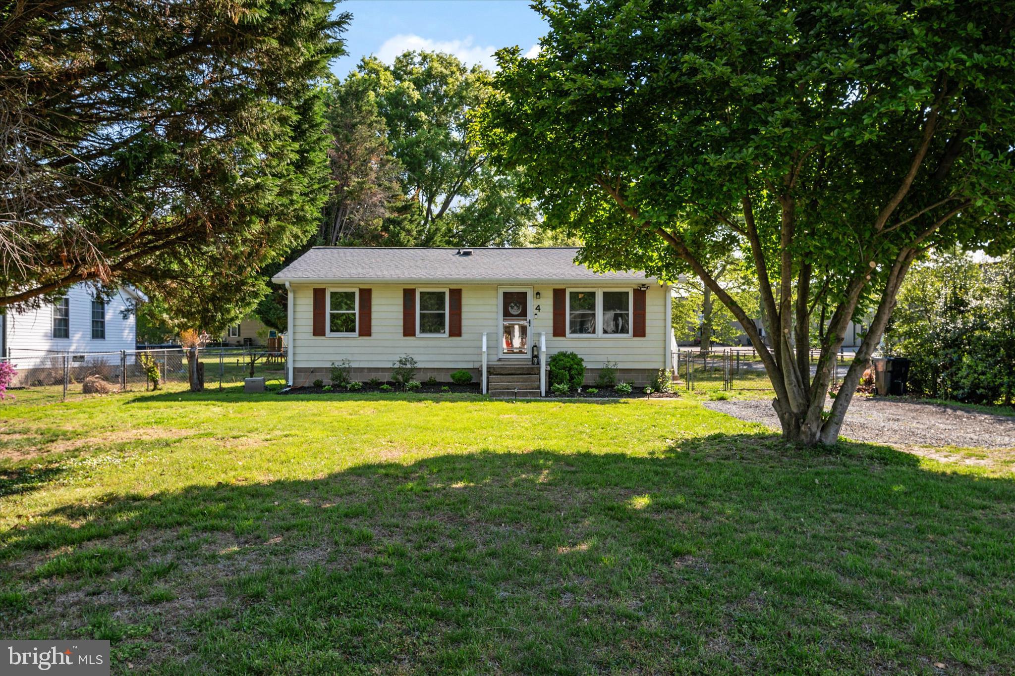 **Open House Saturday, June 6 from 10am-12pm**
Step into this cozy home tucked away in a peaceful, established neighborhood. Designed for easy living, it’s an affordable, low maintenance option perfect as a starter or downsize. 
Inside, you’ll find fresh paint and updated flooring which creates a modern feel from the moment you enter. The living room offers a welcoming space to relax and entertain.
Enjoy year round comfort with central air installed in 2025, adding peace of mind and efficiency. Outside, the spacious lot features a fully fenced backyard, fire pit and deck perfect for privacy and outdoor enjoyment. Conveniently located in the heart of Ridgely, you’ll enjoy easy access to local favorites, nearby parks, and the charm of a close knit community. With quick connections to Route 404, commuting to work over the By Bride, surrounding towns and the Eastern Shore’s beaches is a breeze.
With thoughtful updates, a functional layout, and convenient location, this home is truly move in ready. See this home before someone scoops it up first!!