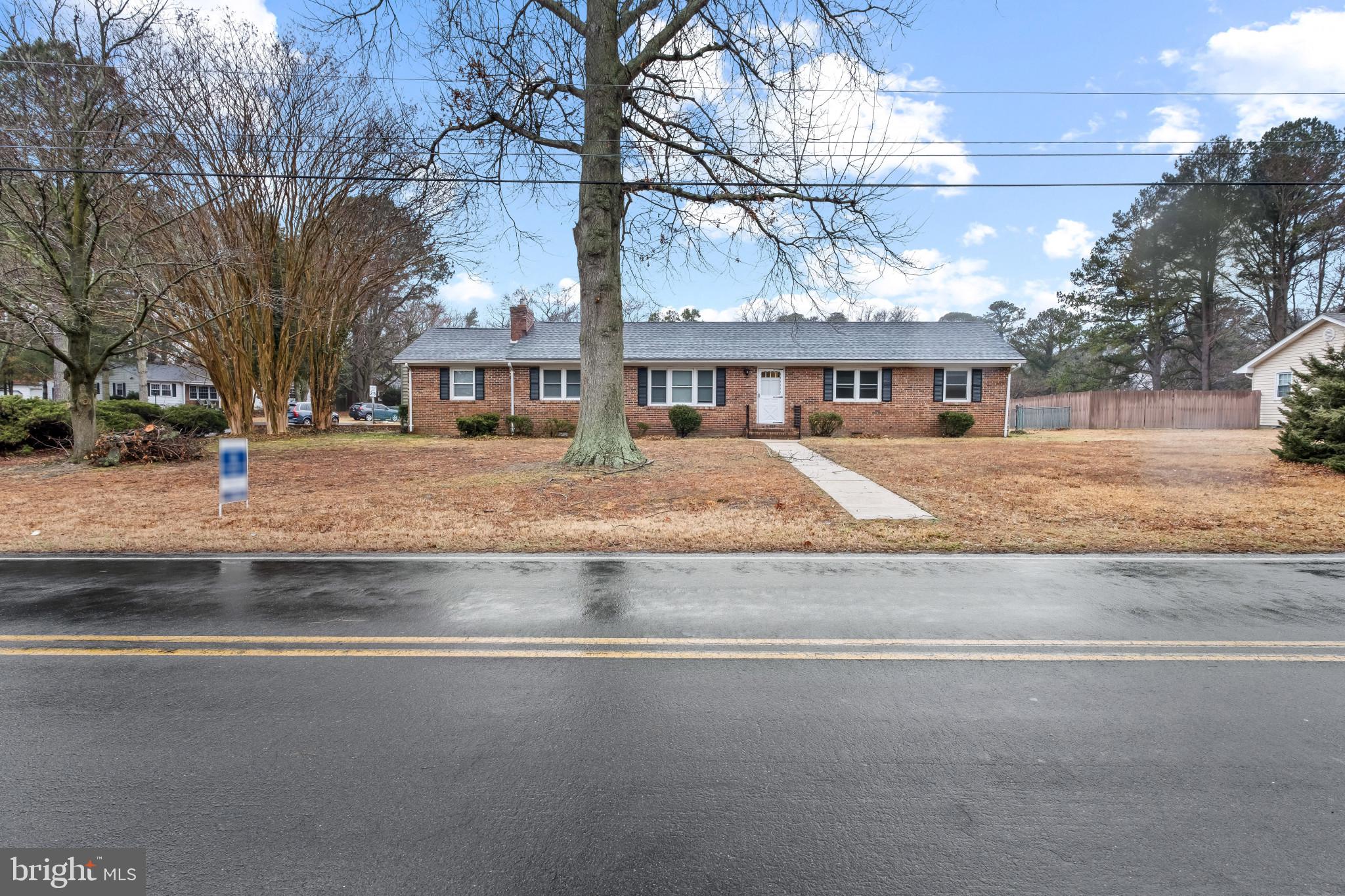 If you’ve been looking for space, convenience, and no city taxes — this one checks the boxes.

This 3 bedroom, 2.5 bathroom home sits on a large corner lot just minutes from downtown Salisbury, giving you easy access to shopping, dining, and everyday amenities while still enjoying a little extra breathing room. Inside, you’ll find hardwood floors and a cozy brick fireplace with a woodstove insert that adds warmth and character to the living space. The kitchen features granite countertops and plenty of prep space. The primary suite includes a brand new tile shower in the attached bath for a fresh, updated feel. Outside offers even more flexibility with a fenced rear yard, shed, attached 2-car garage, and an additional detached 1-car garage with workshop space — perfect for hobbies, storage, or projects. Plenty of space inside and out, a convenient location, and county taxes make this home one you’ll want to see.