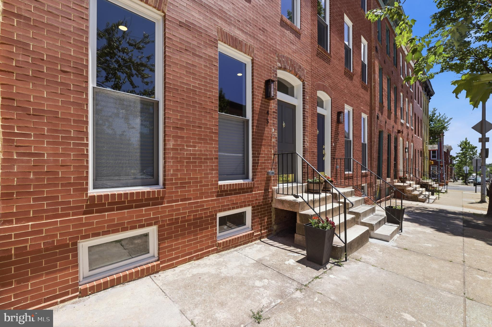 Over 50K in incentives!. THIS IS NOT JUST A NEW HOME THIS IS ANOTHER WHOLE NEW BLOCK IN THE EVER GROWING SOUTH WEST BALTIMORE COMMUNITY! Union Square has so much to offer with 4 parks in walking distance, a community garden, community center and more! ******* HUGE CHAP tax credit (greatly reduces your taxes for 10 years giving you more buying power!) PLUS - 10K V2V incentive that can be used towards down payment and closing costs (as long as V2V has money in their program) and Buy Back the Block (gives up to 20K to eligible buyers). PLUS ADDITIONAL 20K INCENTIVE WITH BVRI PREFERRED LENDER (CALL LISTING AGENT FOR DETAILS) PLUS LNYW (16K for UM employees and 18K for LifeBridge employees)These and other grant programs may be stacked. NOTE:These homes are fully rebuilt, everything is new except the foundation which is solid as the rock they were built on. Luxurious 2,344 square feet of modern amenities and clean energy saves you an estimate of 60% on your utility bill. ** Newly Rebuilt Home meaning other than the foundation, the marble stoop and some brick, we have newly constructed everything; New Water lines, New sewer lines, New Framing, New walls, New Floors, New windows, New Roof, New Electric, New Plumbing, New Heating and Air, New Water Heater, systems and more. Step into this beautifully rebuilt 3-bedroom, 2.5-bath home featuring an open floor plan with high ceilings, tall windows and recessed lighting throughout. The spacious living room boasts floor-to-ceiling windows, filling the space with natural light. HARDWOOD FLOORING flows seamlessly into the eat-in kitchen, which showcases brand-new quartz countertops, stainless steel appliances, and a huge island with seating. Don't miss the convenient powder room on the main level, bedroom level laundry, mudroom and a fantastic outdoor space. The fully fenced backyard is perfect for entertaining. Upper 1 offers the stunning primary suite, complete with a private full bath with double vanity, step-in shower and spacious closet. BR #2 has access to the good sized full hall bath. Upper 2 boasts BR #3 and large laundry room. Brand-new carpeting extends throughout the upper level. The lower level includes a conditioned space with extra insulation for added protection and an abundance of storage space. This stunning home is truly a **must-see**—don’t miss your chance to call it home!
