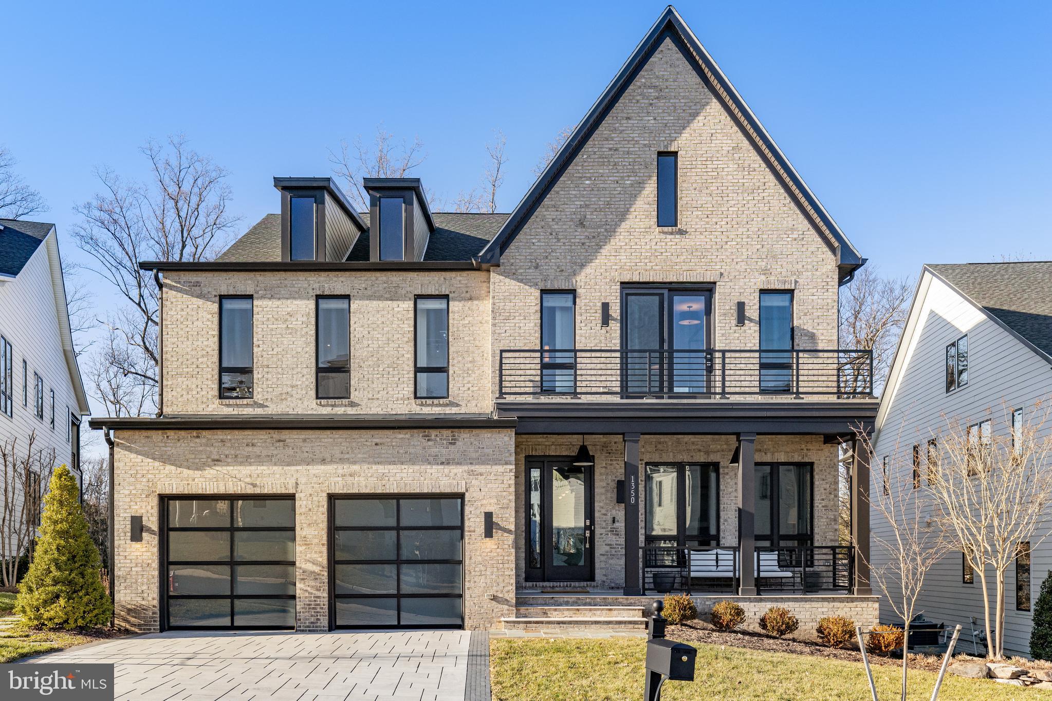 Exquisite Modern Farmhouse built in 2021 by Toll Brothers in the seclusive The Retreat of McLean community, sitting on a premium lot backing to trees. Gorgeous architectural features, custom finishes, and designer appointments throughout the 8,000+ sqft of luxury living. The owners have since added many extraordinary and top of the line features, over $150,000! The spacious open floor plan makes this an entertainer's paradise, yet also offering intimate spaces for everyone's enjoyment. The wide-plank luxury vinyl flooring run throughout the home. 10ft ceilings on the main level plus the oversized windows bring light to every corner. There is a walk-in closet ready to install an elevator for all levels. The main level highlights a glass wall dividing the foyer and the library, paneled walls run along one side, like the model, the family room is spacious with a Primo 60 in gas fireplace and a 12ft multi-panel pocket door opening to the porch with an automated retractable screen and stairs to the fenced backyard and flagstone patio. The gourmet kitchen is a Chef's dream with a huge island with cabinets, lots of cabinet space, under cabinet lighting, top of the line appliances, walk-in pantry and butlers station. The mudroom can be used as a multi-purpose room which includes lots of cabinets, plus a large custom cabinet wired for home office. The squared floating split staircase with an abundance of above and below takes you to the loft area with 2 custom wood paneled wall, 3 en-suites each with a walk-in closet, one of them having its own balcony, the luxurious master suite and laundry room. The master suite features a paneled wall, tray paneled ceiling, coffee bar with refreshment refrigerator and cabinets, sliding glass doors to the porch, also with automated retractable screen, a huge dream walk-in closet with shelving and center island, and the grand bath with dual vanities, step in shower with dual shower heads and a free standing soaking tub. The lower level is fully finished with an expansive rec room with paneled wall, glass wall exercise room, a 5th bedroom, full bath and game area with walk-up stairs to the outdoors. Lots of storage under the stairs and the utility room. Convenient location with just minutes to Tysons, downtown McLean, Silver Line Metro, restaurants, main roads and much more! **ALL FURNITURE IS FOR SALE. ** **DYSON VACUUMS ON EACH FLOOR LEVEL, SPRINKLER SYSTEM, ENTERTAINMENT STAND OF ELECTRONICS CONTROLLING THE AUTOMATION OF HOME CONVEYS.**