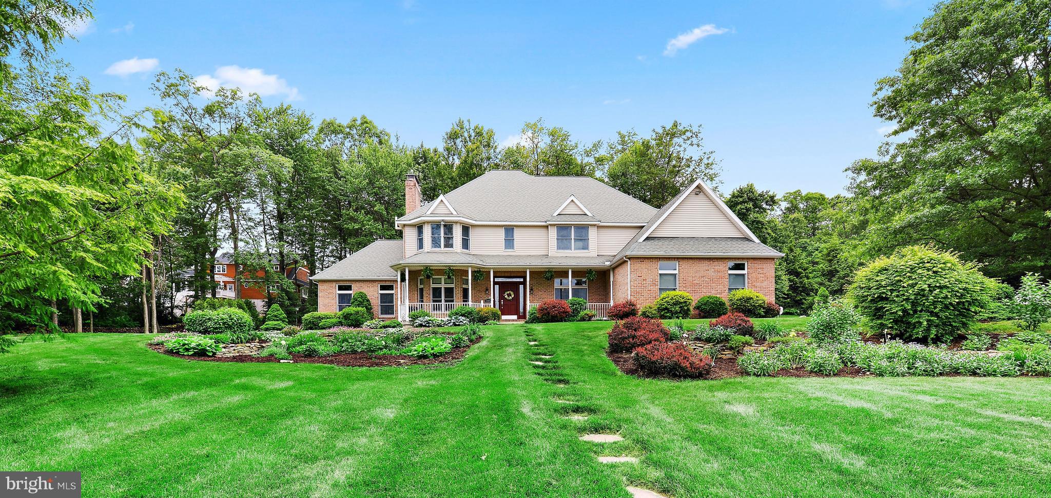 Exceptional custom built 4-bedroom, 4.5 bath home perfectly situated on a beautiful 1.1-acre corner lot. This home has been maintained with excellence inside & out.  Excellent curb appeal greets you as you enter the center hall foyer and immediately notice the attention to detail. The Foyer leads you into Formal Living Room highlighted with a beautiful marble wood burning fireplace and hardwood flooring. Entertaining is easy and elegant in the Formal Dining room accented with Crown molding and chair rail. Custom Gourmet kitchen with abundant cabinet space will be an inspiration to any chef.  This Grand kitchen has been updated with the highest quality including Granite counters and tile back-splash.  Granite center island which is perfect for entertaining or comfortable daily living. New top of the line Jenn-Air appliances. New Built-in beverage center with wine cooler. Large breakfast area overlooks the private gardens. Family room is complete with floor to ceiling all brick wood burning fireplace and beautiful French doors leading to your private back yard patio.  Convenient walk in pantry, first floor laundry and half bath complete the 1st floor.  Impressive open stairway leads you to the second floor with luxurious Master suite with sitting area, separate office and an amazing Master bath with jetted soaking tub, walk in shower and his/her vanities and closets.  Three additional large bedrooms with plenty of closet space and two full baths complete the second floor.   Finished lower level includes workout area, recreation room, full bath and plenty of additional storage.  Beautifully landscaped. 3 car attached garage.