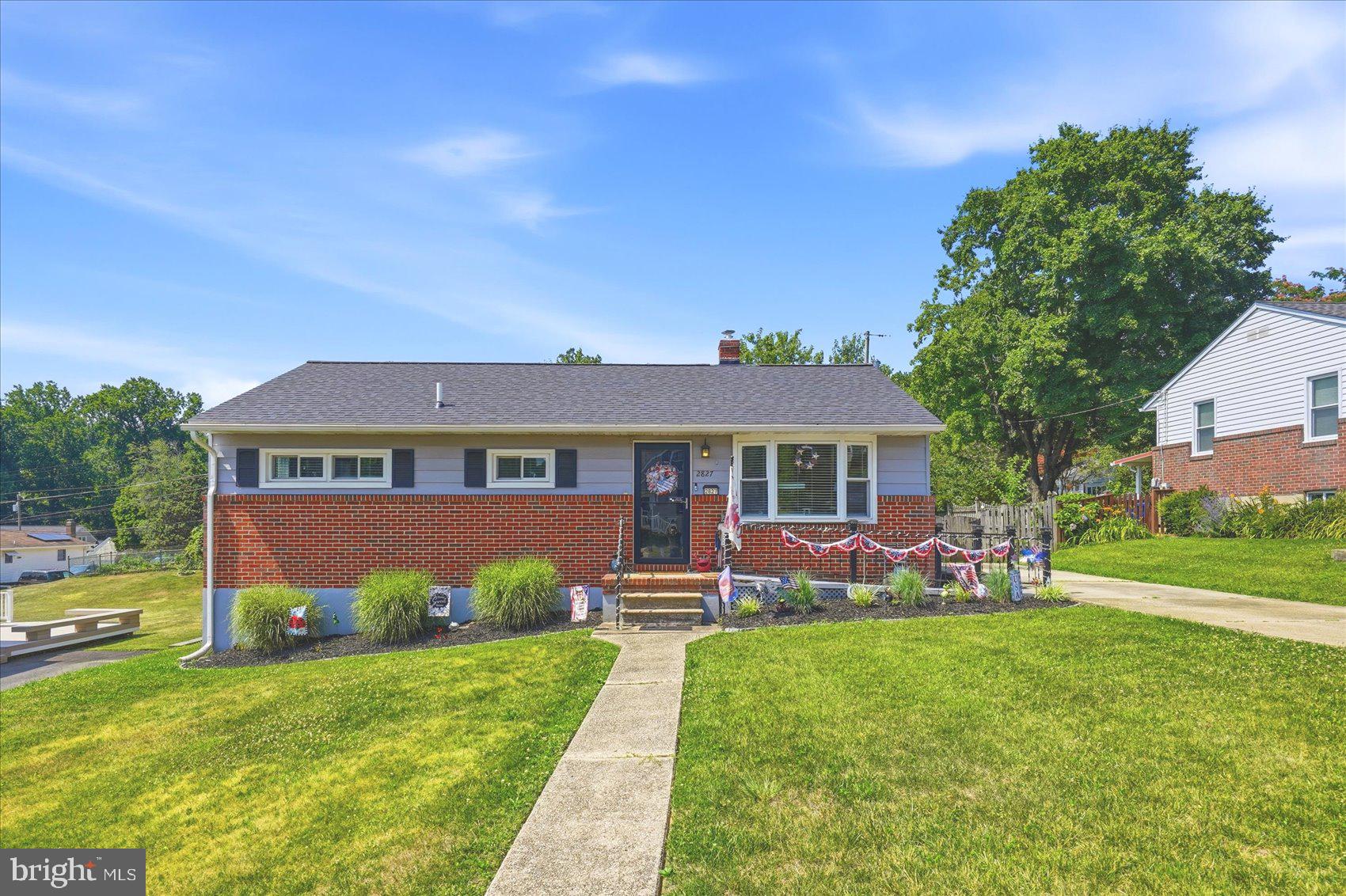 Welcome home to this beautifully maintained 3-bedroom, 2-bath home in the heart of Parkville! Thoughtfully updated throughout, this home features a completely remodeled kitchen, new flooring throughout the first floor, and two updated full-size bathrooms with ceiling fans in all the rooms on the main floor.  Major updates include a new roof, windows, and gutters just 3 years ago, plus an HVAC system updated in July 2025. The dining room was converted from a bedroom and offers the flexibility to easily be converted back, depending on your needs. The finished basement provides additional living space, perfect for a rec room, office, gym, or play area. Off the kitchen, the back porch has been enclosed and transformed into a cozy year-round nook with its own split heating and a/c system—ideal for morning coffee, relaxing, or extra entertaining space. Enjoy the large backyard, perfect for pets, gatherings, gardening, or simply spending time outdoors. Move-in ready with updates already done!  Truely turnkey.  Won't last!  Schedule your appointment today!