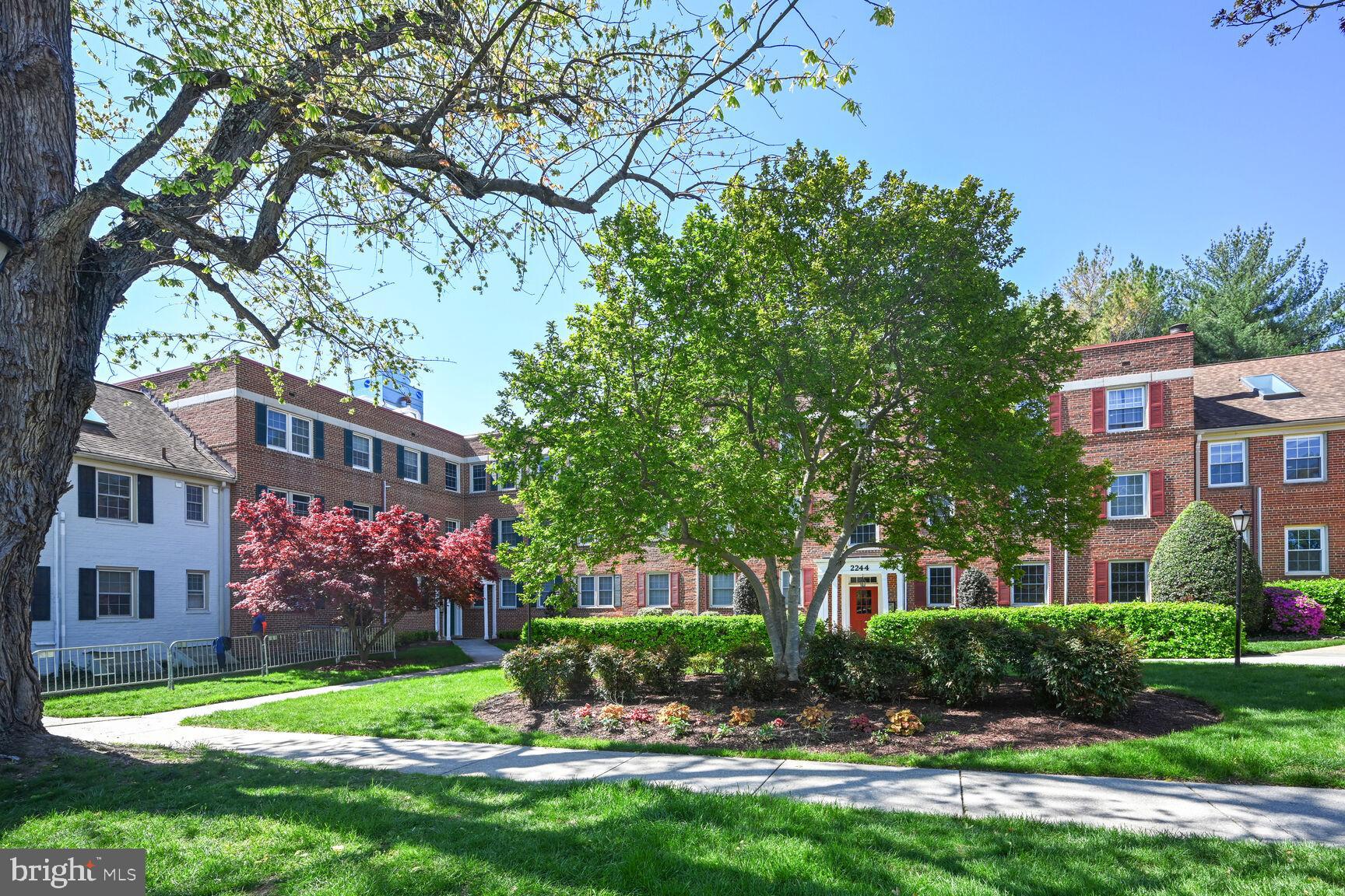 Exceptional, sun-filled, and spacious top-floor corner unit featuring two bedrooms and one bath in the desirable Rock Creek Gardens Condominium.

This inviting home boasts serene views of trees and beautifully maintained grounds from every window. The entrance foyer leads to a separate dining room with crown moldings and a walk-in closet. This space seamlessly connects to the kitchen on one side and the living room on the other.

The large, bright living room with two windows is enhanced by a wood-burning fireplace with a wood mantel, built-in bookcases, and cabinets.

The updated kitchen with a window is equipped with granite countertops, generous storage cabinets, and stainless steel appliances, including a new GE stove, range hood, and refrigerator.

Two well-sized bedrooms each offer ample closet space with built-ins. Fresh paint and hardwood floors throughout. Washer and dryer in the unit.

Condo fees cover water, sewer, pool access, and trash. Rock Creek Gardens community amenities include an on-site management office, beautifully manicured grounds, picnic areas, parking, a large recreational swimming pool, and is pet-friendly.

Located near Silver Spring Metro and Silver Spring's fine shops and restaurants. This prime location is steps away from Rock Creek Shopping Center, which features Parkway Deli, a gym, shopping, and dining options. Close to Rock Creek Park and trails, with easy access to Downtown Silver Spring, Chevy Chase, Bethesda, and DC.

Ideal location, natural light, a wood-burning fireplace, in-unit washer and dryer, windows in every room, hardwood floors throughout, crown moldings in the dining and living rooms, ceiling fan, well-organized closets, fresh paint, and parking make unit W-303 a wonderful and welcoming home!