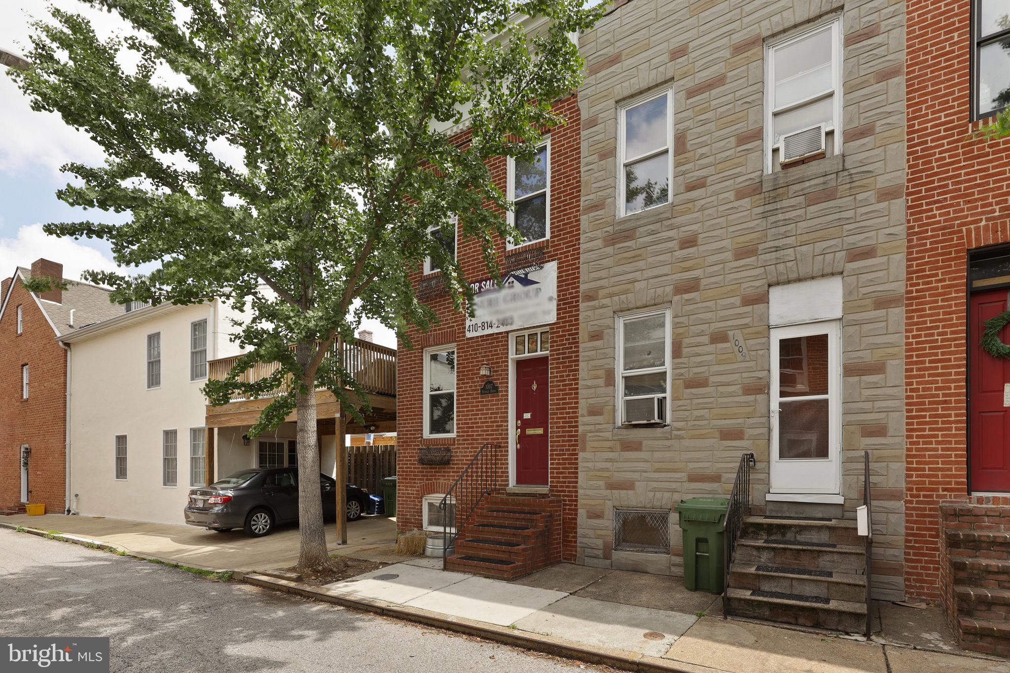 Lovely home on quiet block but only steps to all the action. Enjoy easy access to downtown.  Home has recently renovated kitchen and baths. Gleaming hardwoods cascade throughout. SS appliances.  Tons of natural light. Tall ceilings. Exposed brick. Awesome private rear patio off main level makes it perfect for entertaining. 3 bedrooms with 1.5 baths. Schedule a private tour today!