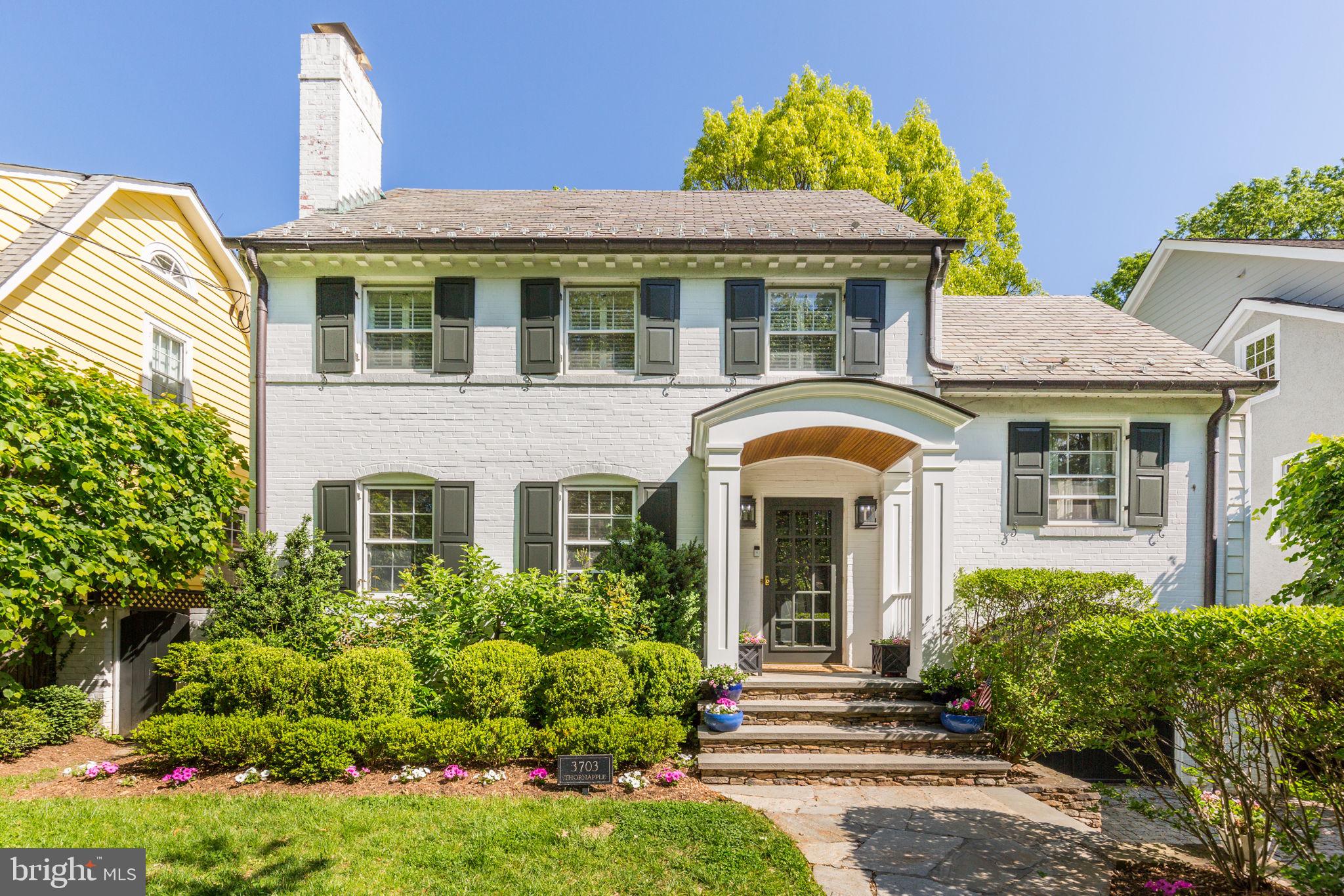 **New Price on This Timeless Classic** One of the most picturesque streets in coveted Chevy Chase Section 5 — where tree-lined sidewalks, gracious homes, and a true sense of community create an unparalleled place to call home. This elegant home welcomes you with beautifully updated interiors, refined finishes, and sun-drenched spaces designed for everyday living and entertaining. Inside, the beautifully renovated kitchen is the heart of the home — featuring custom cabinetry, quartz countertops, Brunschwig & Fils wallpaper, designer hardware, a new refrigerator, and serene views with direct access to the rear patio and backyard. Stylishly updated bathrooms showcase stunning Ann Sacks and Waterworks tile, polished nickel fixtures, and thoughtful, timeless design. A gorgeous family room addition offers the perfect place to relax or entertain, with a large bay window, elegant Schumacher window treatments, new carpet, a full bath accented by Quadrille wallpaper, and plantation shutters. Offering over 2,800 square feet on four levels, the home features 4 bedrooms, 3 full baths, and a finished lower level with an additional half bath. Formal living and dining rooms, anchored by a classic wood-burning fireplace, offer gracious spaces perfect for gatherings. The custom touches and striking designer light fixtures add to the home’s elevated and thoughtful design, including custom built-ins, crown moldings, arched doorways, hardwood floors, window blinds, and striking designer light fixtures. Additional highlights include a finished and heated garage with luxury vinyl flooring — ideal as a playroom, gym, or creative studio. Step outside to a large rear patio and a perfectly flat, professionally landscaped backyard — bursting with vibrant blooms with a sprinkler system — offering ample room to enjoy today or expand. Stroll to Brookville Market, the Farmers Market, and favorite neighborhood spots like La Ferme and Olympia Café. With easy access to playgrounds, parks, and top-rated schools, this home offers the perfect blend of community, convenience, and classic Chevy Chase living  —  An Exceptional Opportunity in a Dream Location — there's truly no better place to be!