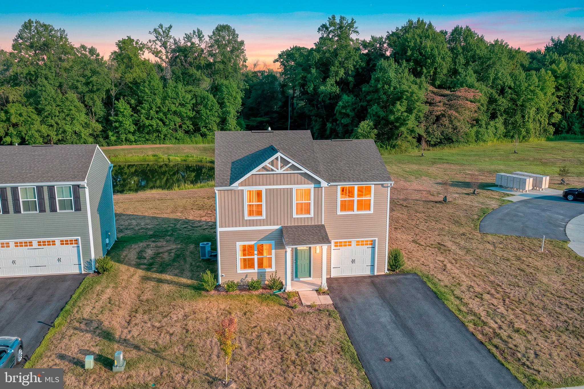 Welcome to 135 Gypsum, located pond-front in Stonington. This home is under three years old and offers maintenance-free living in a quiet setting.
The first floor features an open floor plan with luxury vinyl plank flooring and recessed LED lighting throughout. The kitchen has stainless steel appliances, ample cabinet and counter space, and a convenient pantry. A half bathroom
finishes this floor.
The second floor includes three large bedrooms. The primary bedroom has wall-to-wall carpet, a private bathroom, and a large walk-in closet. The two additional bedrooms have wall-to-wall carpet and large closets and share a hallway bathroom. 
135 Gypsum allows you to live the way you deserve.