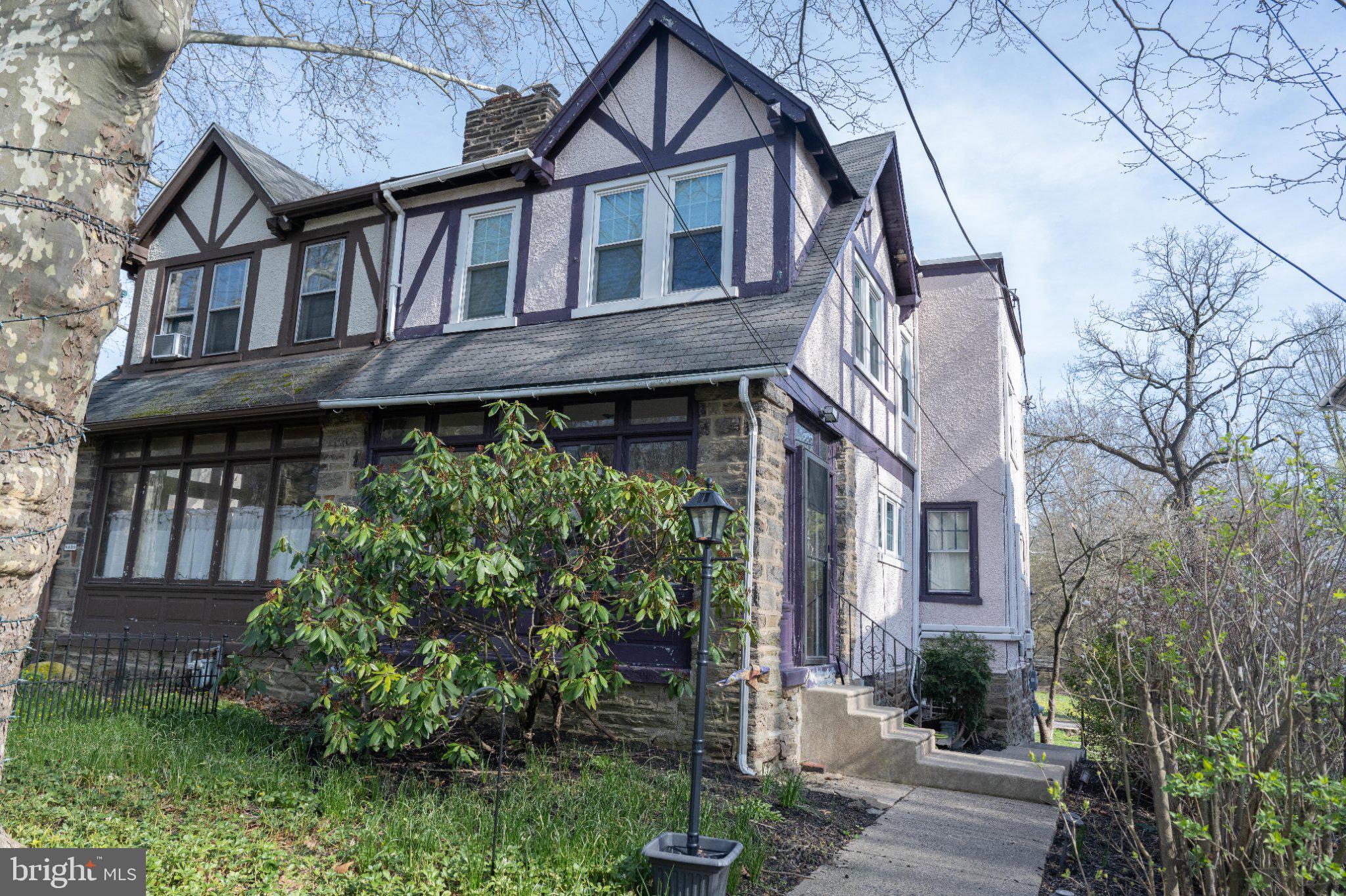 Opportunity awaits at 8037 High School Rd—a spacious 2-story home full of potential, perfectly positioned across from a park and backing up to a beautiful, peaceful creek. This property is in need of repair, making it ideal for investors or buyers looking to customize and create their dream home.

Inside, you’ll find 3 bedrooms and 1.5 baths, featuring wide steps leading upstairs, a cozy wood-burning fireplace, and a sunroom/mudroom that adds charm and functionality. The open kitchen and dining area offers a generous layout, ready to be transformed into a modern gathering space. Washer and dryer are included for added convenience.

Step outside to enjoy a large back deck with direct access to the backyard driveway—perfect for entertaining or relaxing while taking in serene creek views. The home also offers 2-car rear parking and an enclosed garage that can be reopened for additional parking or reimagined as an entertainment space.

Ideally located, this home is within walking distance to High School Park, the train station for easy commuting, and local shopping favorites like Goat House Creamery.

Additional highlights include:
 • Solar panels on the roof
 • Split-unit cooling system (2019)
 • Radiant gas heating (converted from oil)
 • New water heater
 • Septic system redone in 2020
 • Unfinished basement for added storage or expansion potential

With exterior painting needed and updates throughout, this property is a fantastic canvas in a desirable setting. Whether you’re looking to renovate, invest, or build equity, this home offers incredible upside in a scenic, walkable location.
