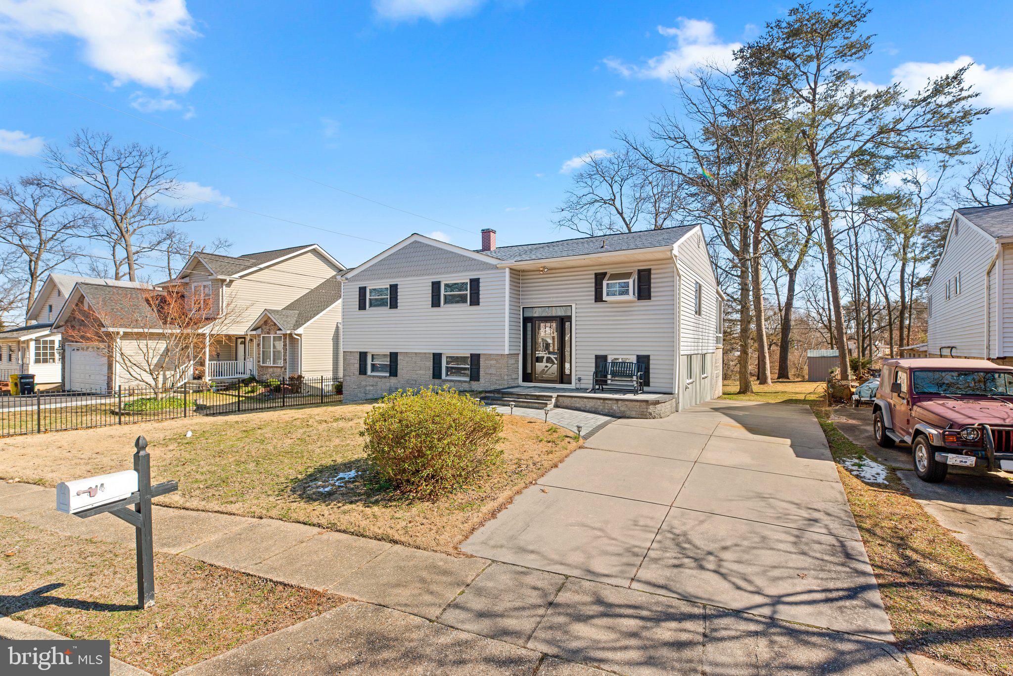 Beautifully updated home with water access to navigable water in the Twin Coves Community of Glen Burnie! This remodeled 3 bedroom waterfront home oasis awaits you! Enjoy your own private water views of Furnace Creek from the sunroom off your dining room or the backyard swing which is positioned perfectly for the sunrise while you have your morning coffee! Private floating pier with 2 kayaks convey and Rams Head Dockside is only a short 15 minute kayak ride. Updates over the last several years include a fully remodeled kitchen with granite counters, stainless steel appliance package & white cabinetry. Refinished natural hardwood floors on the main level, updated vinyl Pella windows, architectural roofing shingles, new front door (w/ transom) and custom front paver walkway & porch. Both the hall bath and master half bath have been remodeled within the last several years. Home has barn door style closet doors and a hallway bath pocket door to maximize space.  Large finished recreation room in the walkout basement includes a combination ping pong/pool table. Enclosed storage area under porch provides additional secure storage space. One year Cinch Home Warranty included in the sale.
