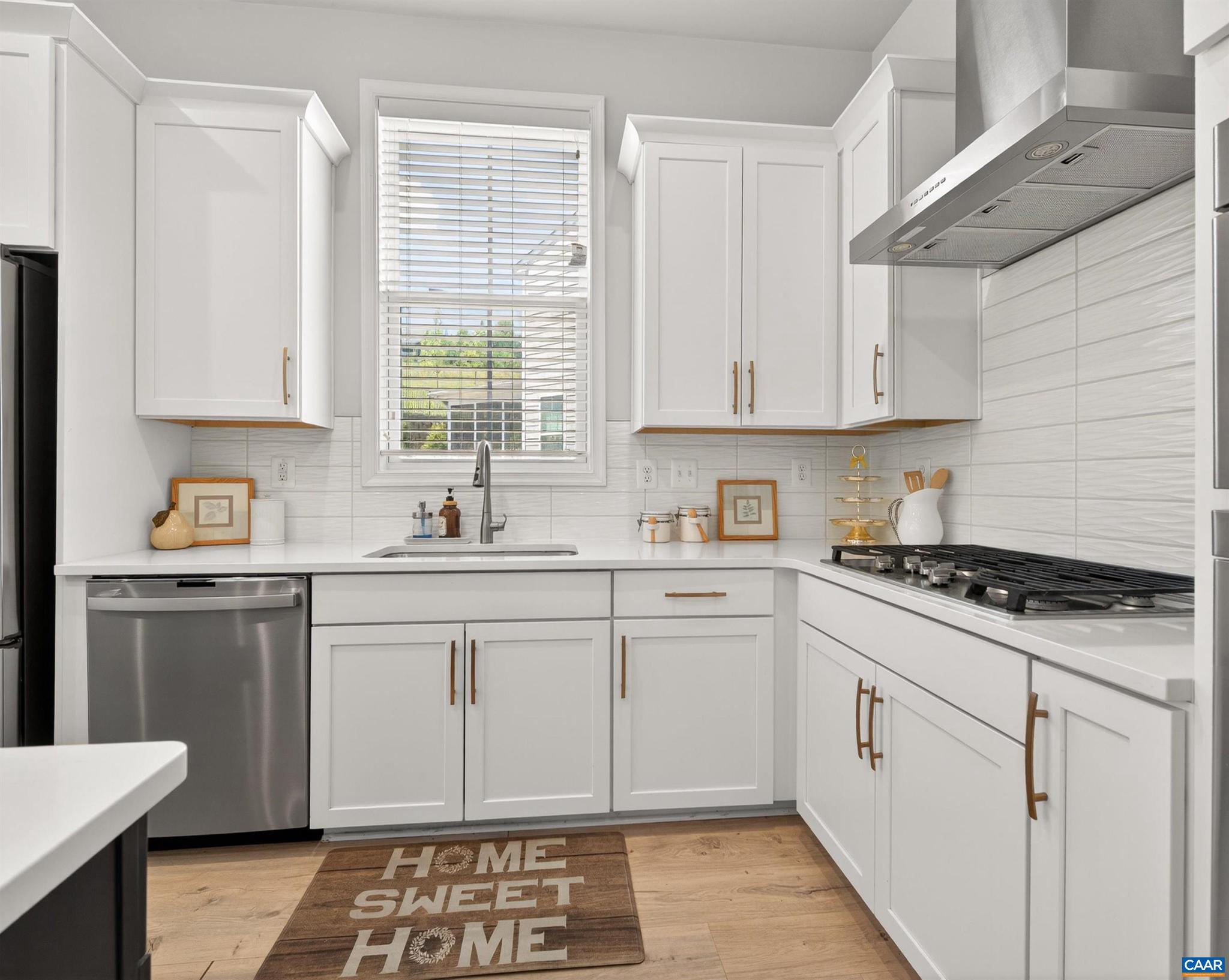 Minutes from Downtown Charlottesville, Spring Hill Village offers this (newly built in 2022) Main Level stunner! Light Filled upgraded end unit offers the perfect blend of low-maintenance living & thoughtful design. 3 Bedrooms 2.5 Bathrooms & open concept layout. Second level has spacious loft, 2 additional bedrooms and a full bathroom along with utility room & abundant storage w/ flexible living space. Some upgraded Features include: Impressive Gourmet Chef's Kitchen & tile backsplash, windows added to the great room, Oak Stairs & elegant knee wall instead of pickets. HVAC Zone Control & larger patio. Primary Suite custom cabinetry in walk in closet & elegant storage addition to the spa-like bathroom. Neighborhood amenities to enjoy include: dog park, tot park, fire-pit & walking paths :)  HOA includes: water/sewer/trash/lawncare, fertilizer, top soil, trimming & road maintenance.,Granite Counter,Maple Cabinets