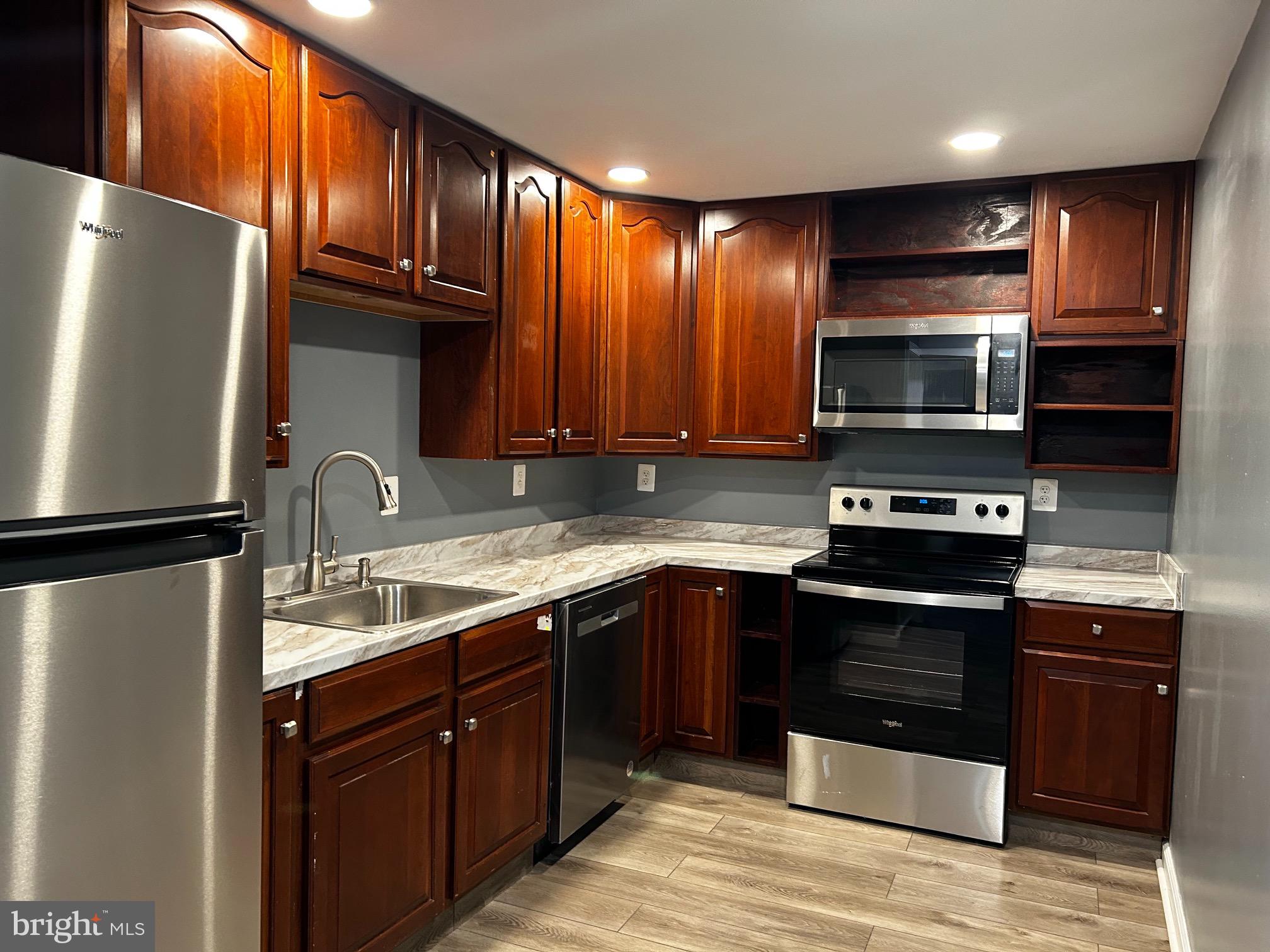 Basement Apartment! ALL UTILITIES ARE INCLUDED. This fully finished basement apartment unit offers a seamless blend of comfort and style, providing an exceptional living experience. As you step into this thoughtfully designed space, you'll immediately be captivated by the contemporary aesthetic and high-end finishes throughout.

The living area boasts a cozy ambiance with an electric fireplace, creating a warm and inviting atmosphere perfect for relaxation and entertaining. The sleek stainless steel appliances in the well-appointed kitchen not only elevate the overall aesthetic but also offer a premium culinary experience for residents. Whether you're cooking a gourmet meal or enjoying a quick snack, the kitchen is a culinary haven.

The private entrance ensures a sense of exclusivity, providing residents with the freedom and privacy they desire. As you enter the apartment, you'll be greeted by an open and spacious floor plan that maximizes every inch of the living space. The well-lit rooms and carefully chosen color palette contribute to an airy and bright atmosphere.

Step outside, and you'll discover an added bonus – access to a community pool. Imagine lazy summer afternoons spent lounging by the pool, enjoying a refreshing swim, and creating lasting memories with neighbors and friends. The community pool becomes a retreat just steps away from your private sanctuary, offering a perfect escape on warm days.

With its upscale features, attention to detail, and access to community amenities, this property redefines the concept of a basement apartment, providing a living space that meets the highest standards of comfort and sophistication. Welcome home to a haven where luxury and convenience converge.