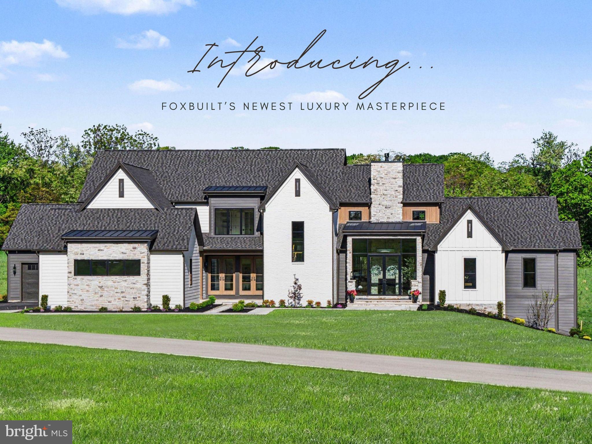 A FoxBuilt modern masterpiece rooted in natural beauty. This home situated on 1.61 offers panoramic views of the mountains and golf course.  From the moment you arrive, the exquisite craftsmanship, thoughtful design, and luxurious materials of this newly constructed home are immediately apparent. Sophisticated yet inviting, the home’s exterior showcases timeless stonework and warm tones that set the stage for what lies within—a harmonious blend of organic textures and modern elegance.

Step through the foyer and experience a striking introduction to the home’s interior, where a double-sided stone fireplace draws the eye and sets the tone for the open concept living space. Vaulted ceilings with wood beams, expansive windows, and a seamless integration of natural elements create an atmosphere that feels both grand and grounded.

The heart of the home is the gourmet kitchen, designed with rich textures and earthy materials. From the custom cabinetry to the sleek, quartz countertops, double entry arched ways to the butler pantry, every element is curated to blend functionality with timeless beauty. 

Flowing to the left of the living space of the home you will find a stylish powder room, and a designer mudroom with lockers, a walk-in closet, and functional storage complete the main level. A generous three-car garage offers ample space for vehicles and gear.

Off the dining area, a warm and inviting great room and sunroom invite connection and relaxation, while a dry bar adds a touch of refinement leading onto the covered deck with a built-in gas fireplace to enjoy year-round outdoor living.

On the main level you will enjoy a primary suite that offers a peaceful sanctuary, combining vaulted shiplap ceilings, exposed beams, and warm wood details. The en-suite bath exudes spa-like serenity, featuring sleek quartz finishes, custom cabinetry, and a spacious walk-in closet complete with a private washer and dryer. 

Upstairs, a loft overlooks the living space below and connects four spacious bedrooms and three full bathrooms. Bedrooms 2 and 3 each offer private en-suite baths and walk-in closets, while Bedrooms 4 and 5 share a Jack-and-Jill bath, also with walk-in closets—providing comfort and privacy for family or guests.

This home is a beautifully crafted one-of-a-kind home designed for both everyday living and unforgettable gatherings.