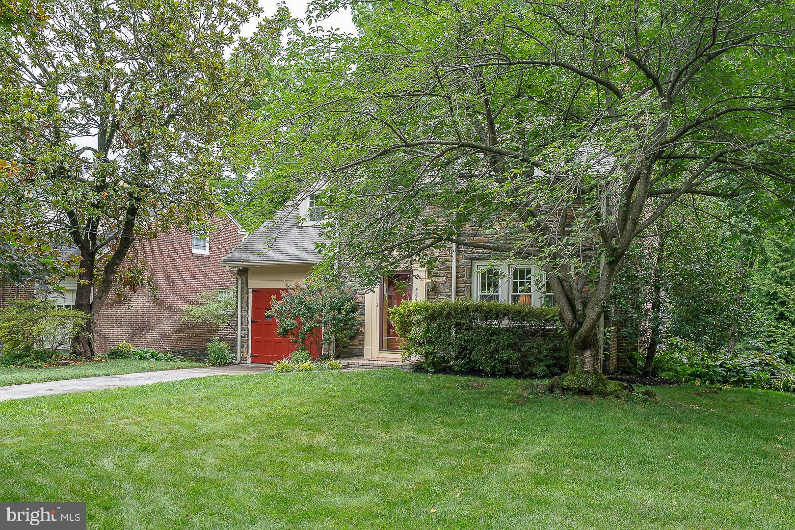 Nestled on a picturesque tree-lined street in the award-winning Radnor School District, this charming 3-bedroom, 2.5-bath Colonial has been thoughtfully expanded for modern living. Highlights include a vaulted family room addition with walls of windows overlooking the park-like backyard, an updated kitchen with built-in seating, and a spacious walk-out lower level with sliders to the large patio, providing flexible space for recreation, entertaining, a home office, or gym. The main level features a living room with a fireplace (wood) and large sunlit windows, and opens to the charming dining room with its built-in display shelves.  The updated kitchen with granite and stainless features unique touches including a banquette seating with storage, a double oven, and stainless appliances. Step into the expansive family room addition, the central hub of the home, spacious and the perfect place for gatherings. An office/nanny’s room and full bath complete the main level.  The upper level features a Primary Bedroom with two closets, and two additional bedrooms with storage and a hall bath.  The lower level was part of the original expansion adding over 1000 sf  for a flexible floor plan. Currently, there is a second family room, laundry room, powder room, utility room,  and three exposures with French doors opening  to the patio and large backyard. The lot is bisected by Tredyffrin Township so the total lot size is .31 ac. Property is in Radnor Township officially and taxes are paid to Radnor and Delaware Co. only. Located in the award winning Radnor Schools, minutes to the Wayne shops and restaurants, the Wayne Farmers Market, SEPTA/AMTRAK, fitness clubs, and convenient to the PHL airport.  Footnote: This home is in Radnor SD, Radnor Township. A portion of the property falls in Tredyffrin Township and is not included in the public records acreage. The total acreage is .31. All taxes are paid to Radnor Township, Radnor SD, and Delaware County.  Per the tax records:  Parcel Assessed in Delaware Co. but located in Chester Co. Professional photos Tuesday.
