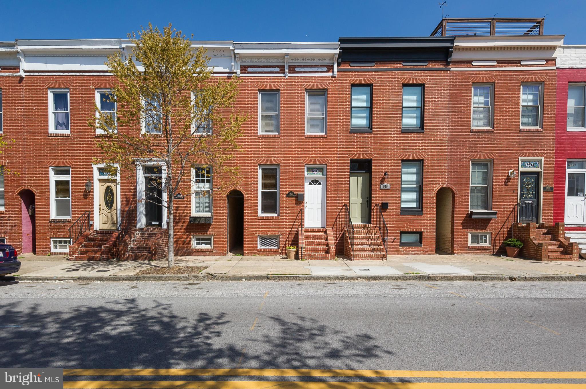 Beautiful 2 bedroom/den home in the heart of Federal Hill! Featuring high ceilings,large rooms,wood floors and tons of original character and charm! Enjoy the gorgeous chef's kitchen with granite counters and SS appliances,convenient first floor laundry/powder room and off street parking! Recent upgrades incl.new roof installed 2105 and water heater replaced in 2013.Please give 24hr for showings