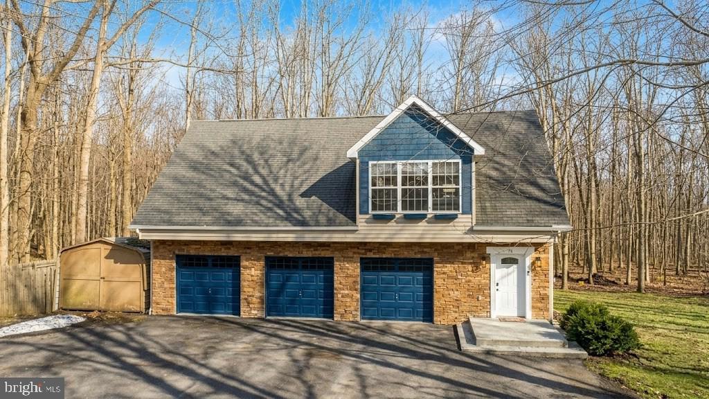 Welcome to 74 Sugar Maple Lane! This 3 bedroom, 4 full bathroom home sits on a 1 acre lot just 1 mile from Deep Creek Lake and Wisp Resort. The lower level offers a 3 car attached garage, perfect for storing your recreational toys or keeping your vehicles in a controlled climate. The lower level also has two full bathrooms, a bonus rec room completed with a bar area and a walkout to the fire-pit in the back yard. The upper level includes an upgraded kitchen, 3 bedrooms, 2 full bathrooms and a private back porch area just off the dining room. The primary suite bathroom also includes a built in sauna. Forced air heat and central AC provides comfortable living year-round. Offering over 3600 square feet of space, this home had plenty of room to entertain guests with ease. Equipped with a whole house backup generator, you are prepared for the toughest weather conditions! This home should certainly make your list of priorities in your search here at Deep  Creek Lake! Call today to schedule a private showing!