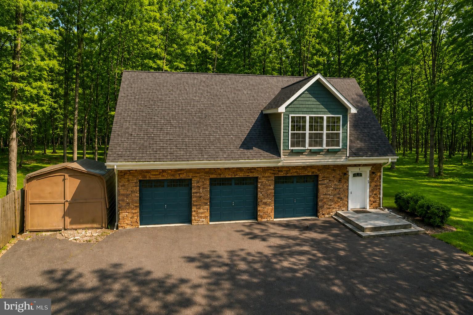Welcome to 74 Sugar Maple Lane! This 3 bedroom, 4 full bathroom home sits on a 1 acre lot just 1 mile from Deep Creek Lake and Wisp Resort. The lower level offers a 3 car attached garage, perfect for storing your recreational toys or keeping your vehicles in a controlled climate. The lower level also has two full bathrooms, a bonus rec room completed with a bar area and a walkout to the fire-pit in the back yard. The upper level includes an upgraded kitchen, 3 bedrooms, 2 full bathrooms and a private back porch area just off the dining room. The primary suite bathroom also includes a built in sauna. Forced air heat and central AC provides comfortable living year-round. Offering over 3600 square feet of space, this home had plenty of room to entertain guests with ease. Equipped with a whole house backup generator, you are prepared for the toughest weather conditions! This home should certainly make your list of priorities in your search here at Deep  Creek Lake! Call today to schedule a private showing!