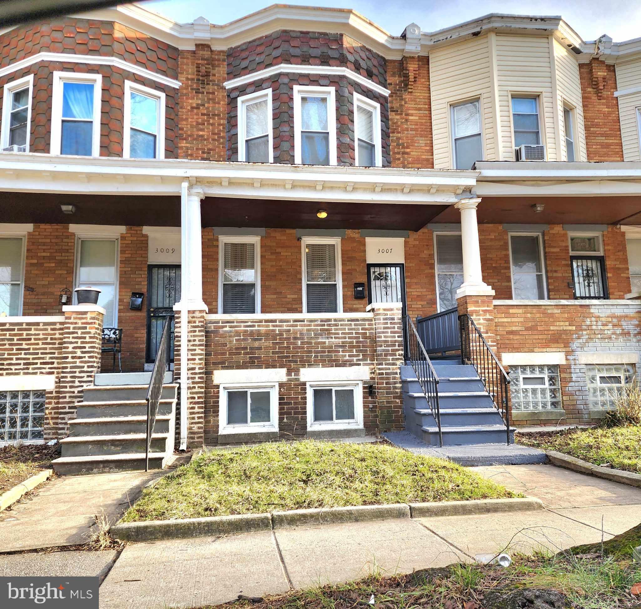 Do not miss the opportunity to check out this fully updated home for less than 200k.  New rubber roof, new HVAC, new flooring throughout, new water heater.  The basement is finished and has a 4th bedroom in it as well as a full bath, and a separate entrance from the backyard. There are 3 bedrooms and an additional full bath on the upper level.  The main level has an updated kitchen and a large family/dining room combo. There is plenty of parking on the street as well as a parking pad in the back of the home. If you enjoy sitting outside, there is a large front porch area as well as a balcony off of one of the secondary bedrooms on the upper level. No ground rent as it was previously bought out.  Tax record does not reflect accurate lot size. This is a great opportunity for an investor to purchase and immediately rent out OR for anyone to enjoy a home that has all of the updates already done for you.  MOVE IN READY! Enjoy the convenience of bus stops, and 2 shopping centers within walking distance.  Your front porch looks out to acres of parkland.