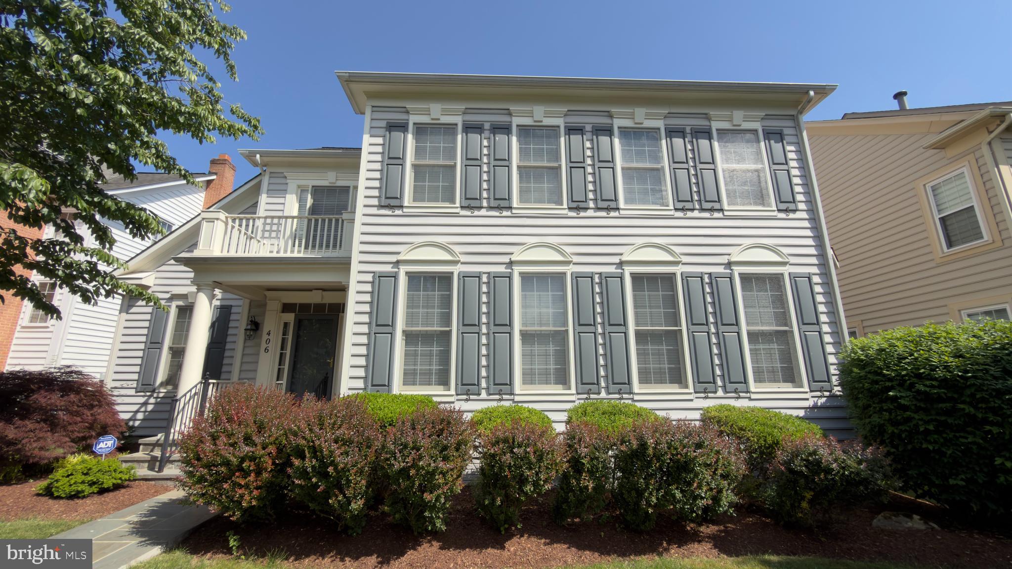 Nestled on a beautifully manicured lot in sought-after King Farm, this elegant and thoughtfully updated residence blends timeless curb appeal with spacious, comfortable living. An upscale flagstone walk leads to the welcoming covered entry, creating a charming first impression. Located just one block from King Farm Park and only a few blocks from the community pool, this home enjoys a quiet and highly desirable location within the neighborhood. Inside, the home offers an exceptional floor plan with abundant natural light, refined architectural details, and flexible living spaces designed for both everyday living and entertaining.

The main level features hardwood flooring, a graceful foyer with staircase, formal living and dining rooms, and a private fourth bedroom currently being used as a home office. The inviting open-concept kitchen, breakfast area, and family room showcase a stunning wall of windows and a cozy fireplace, creating the perfect gathering space. The kitchen is appointed with granite countertops, updated appliances, and French doors leading to the patio and fenced backyard for seamless indoor-outdoor living. A convenient main-level laundry room adds everyday practicality.

Upstairs, the spacious primary suite offers a peaceful retreat with a spa-inspired updated bath, two walk-in closets, and custom closet systems. Two additional generously sized bedrooms and a well-designed upper-level layout provide comfortable living space for family and guests alike.

The finished lower level offers exceptional versatility with expansive recreation and bonus spaces ideal for a media room, gym, playroom, guest area, or additional home office. The lower level also includes generous storage space and a rough-in for a future full bath ready for your personal design vision.

This meticulously maintained home has been extensively updated, including roof replacement (2018), HVAC (2016), water heater (2020), sump pump (2017), carpet replacement (2023), select Anderson windows (2022), French doors to patio (2022), electric car charger (2021), and more.

Enjoy all that King Farm has to offer, including pools, parks, tennis and pickleball courts, walking trails, shuttle service to Shady Grove Metro, and a vibrant village center with shops, dining, and everyday conveniences. Conveniently located near I-270, ICC, and major commuter routes, this exceptional home offers the perfect combination of comfort, style, and location.