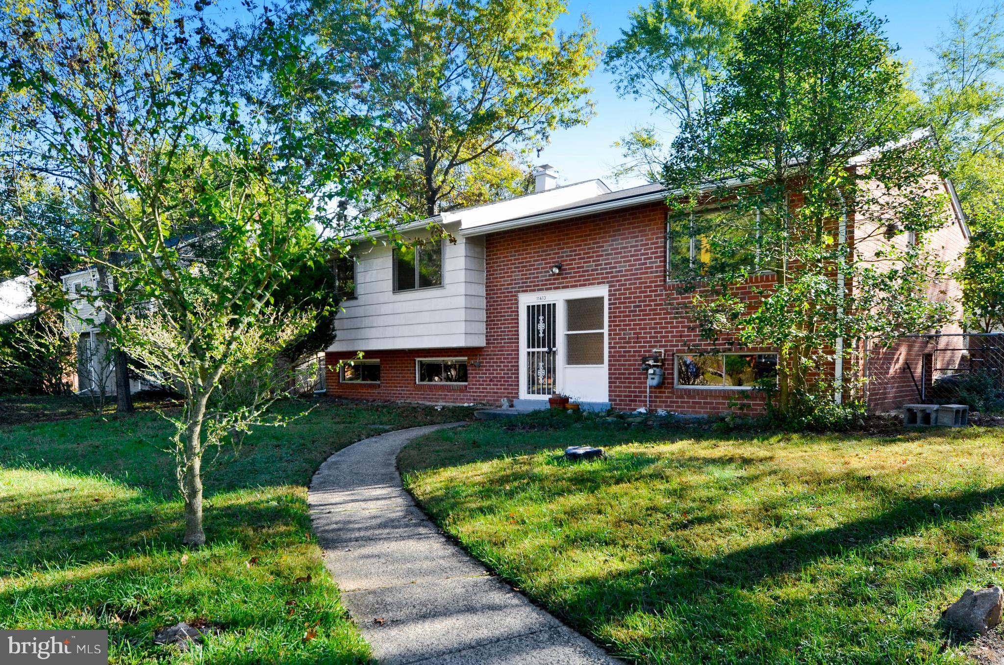 Kemp Mill Estates! 2,250 finished sqft, hardwood floors, new carpet & fresh paint. This home offers a lightfilled floor plan with a huge kitchen & fully finished lower level. Vaulted ceilings, ample storage. You'll love the level backyard-perfect for play & entertainment. NEW HVAC installed 2013. Ready for your personal touches! Convenient to shops, restaurants, & public transportation. Sold as-is