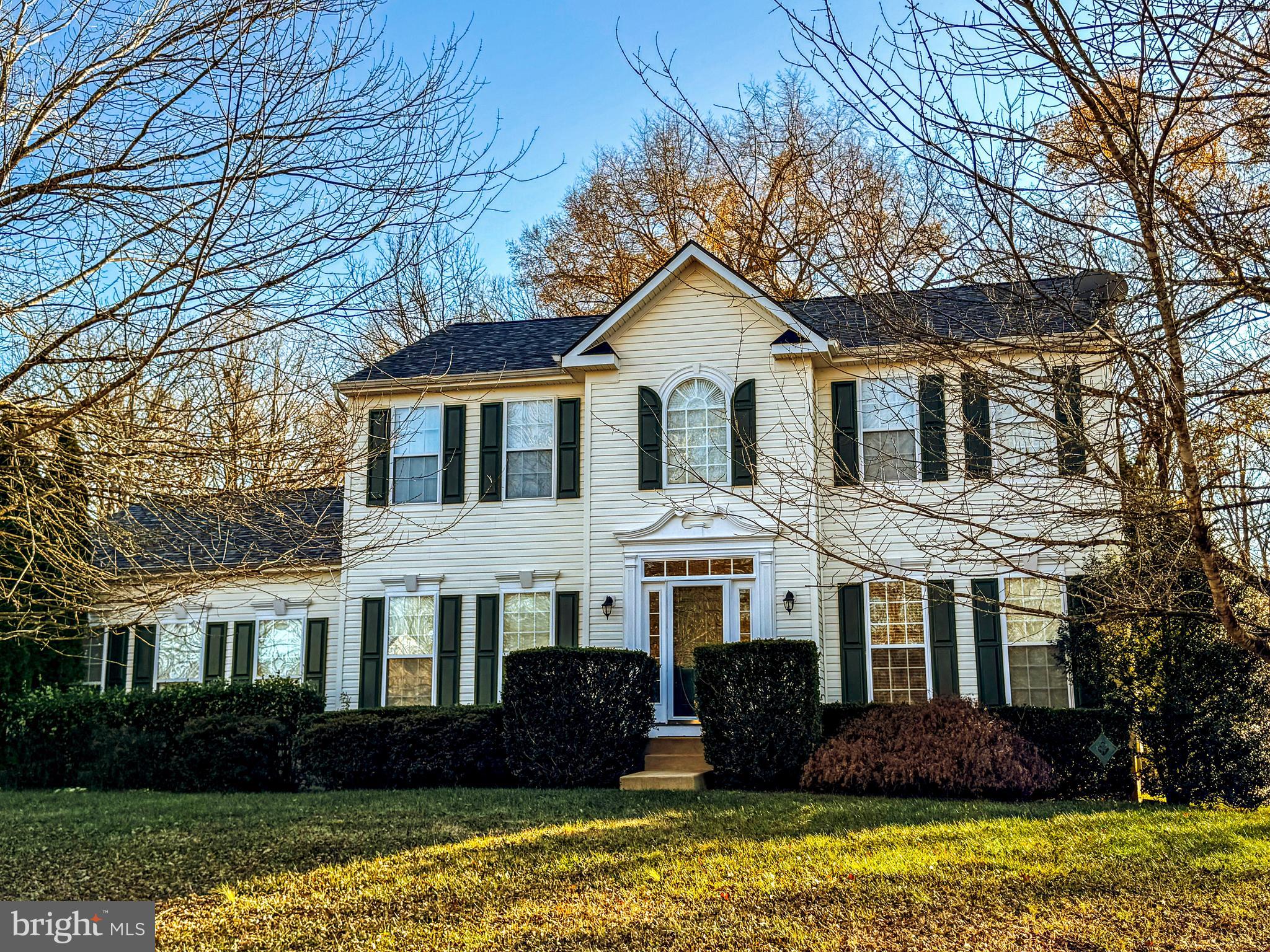 Stunning Updated Colonial - vacant & Move-In Ready! This beautiful 4-bedroom, 2.5-bath colonial home offers privacy and scenic views, backing to acres of community common ground and lush nature. The brand-new kitchen features quartz countertops, new stainless steel appliances, and a center island, seamlessly connected to a cozy sunroom with a wall of windows.  the home is freshly painted in today's popular color, Sherwin William's Aesthetic White. 
The spacious owner’s suite boasts an upgraded bath with a luxury soaking tub, separate shower, and double vanity.  Additional highlights include a large 2-car side-loading garage, a newly paved driveway, a brand-new grilling deck with stairs, and a main-level mudroom/laundry room.
The full basement with walk-up stairs and rough-in plumbing provides ample potential for customization. Conveniently located near great schools, shopping, and transportation, this home is ready for its new owners. Don’t wait—schedule your tour today!