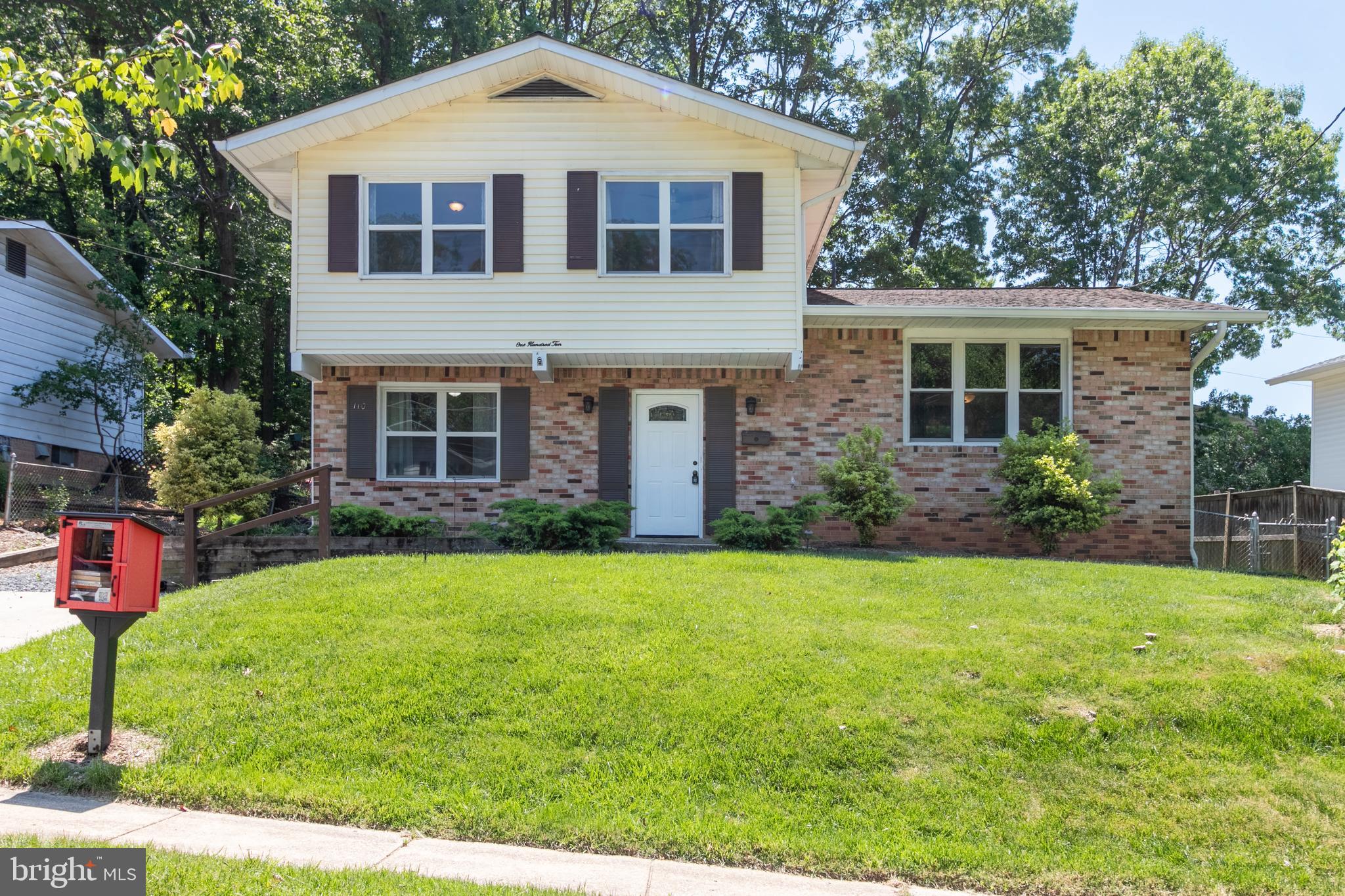 Four finished levels in this totally remodeled gem!  Renovations include: 2019- New roof, HVAC system, windows,  refinished hardwood floors on the living room level,  service line replacement, electric panel heavy up, full kitchen renovation and yard grading. 2020-Gutter cover replacement. 2021- Professional landscaping that includes new patio, stone retaining wall, sod, plants, and driveway grading.  2026- Refinished hardwood floors throughout the upper level,  new vinyl plank flooring on the main level, new carpet in the lower level. The value is undeniable and the location is unbeatable. Nestled in a cul-de-sac and a short distance  from Greenbelt Lake, Buddy Attick Park, major highways, Greenbelt Metro and every amenity  Historic Greenbelt has to offer.  Boxwood Village has a voluntary civic association but NO HOA! Don't miss out! Schedule your showing today.