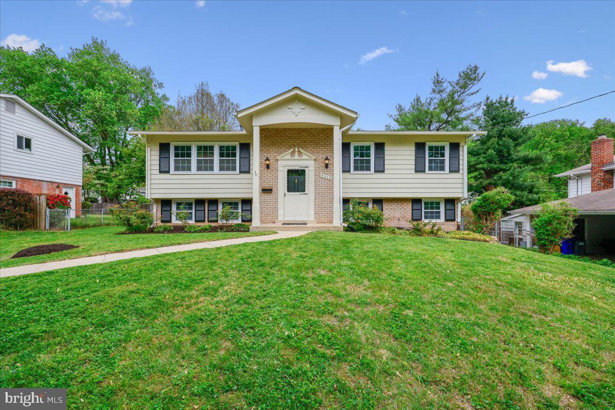 OPEN HOUSE SUNDAY MAY 3rd 1-3pm!!
Welcome Home to this well-maintained 4 bedroom, 2 full bath split-level home, perfectly situated on a lovely fenced-in lot ideally located in prestigious Rock Creek Manor, blocks from the picturesque lakes, woods & trails of Rock Creek Park, minutes from schools, places of worship, Rockville Town Center shopping, Metro and major commuter routes. This home has been lovingly cared for and updated with new kitchen & baths, windows, roof,  electric panel, and HVAC and is turn-key and ready to move in!

FEATURES & AMENITIES
4 bedrooms, including primary bedroom suite, 2 full baths
Welcoming foyer with luxury vinyl plank floor, new exterior door
Sun-filled main level features a formal living room with bright new picture windows, gleaming refinished hardwood floor, and easy flow to the dining room featuring hardwood floor, designer lighting, and large window to the rear gardens
The spacious renovated kitchen with eat-in breakfast area features quartz counter top, stainless steel sink, glass tile backsplash and is rounded out by new stainless steel appliances including gas cooking and ceramic flooring.  Convenient glass door access to step down porch to the level fenced yard, perfect for relaxing and entertaining with family and guests
Primary bedroom with sparkling refinished hardwood floor, ceiling fan, and large double door closet incorporates a remodeled ensuite primary bathroom with luxury ceramic tile, designer lighting, and pedestal sink
Three additional upper level bedrooms with gorgeous refinished hardwood flooring, ceiling fan lighting, and spacious closets
Upper level hall tub and shower bath with designer vanity and lighting with ceramic flooring; convenient hall linen closet nearby
Lower level recreation media room, perfect for entertaining and relaxing with family and friends; new carpeting and new daylight windows and new lighting
Lower level 4th bedroom affords new carpeting, windows, closet
Lower level walkout storage and laundry/utility room round out the lower level; rough in available for 3rd full bath
Some of the special features of this home include: level fenced rear yard, fresh paint inside and out, new flooring, fixtures (2026), 200 amp electric panel heavy up (2025), kitchen and appliances (2025), windows (2020), HVAC (2018). Turn your key, unpack, and enjoy your new home!