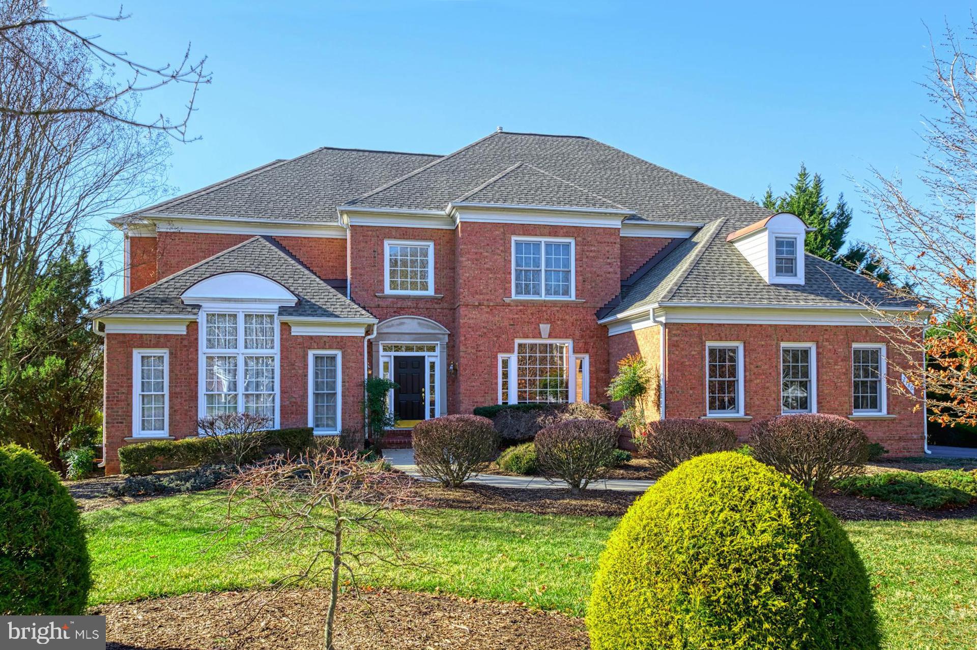 Fabulous waterfront colonial with stunning western views off all three levels of rear of home!!!  Wonderful upgrades throughout including refinished hardwood floors, newer lighting, moldings, two-story windows, palladium windows, newer appliances, two newer HVAC units, recent roof, freshly painted interior, grand primary suite and walkout lower level!!!  What an amazing versatile floorplan with sunroom/library/music room/living room/main floor bedroom/office all wrapped around the stunning Great Room with two-sided gas fireplace.   This unique Stone Ridge Compton model is rarely available and features over 7,000 total square feet... with 6,000 sq.ft. finished.   Welcoming foyer with hardwood floors and new sconces.   Large dining room with new chandelier, wainscoting, dental molding and recessed lights.  Open gourmet kitchen with granite, stainless steel appliances, island with barstool seating, gas cooktop, hardwood floors, large pantry and desk area.  There is both a breakfast room and sitting area off the kitchen, both overlooking the community's upper lake.   Upper level includes a grand primary suite with sitting room, walk-in closet and large bath with sumptuous Jacuzzi whirlpool tub and separate shower.   Three additional large bedrooms upstairs, each with walk-in closets, and two additional full baths.  The lower level is filled with windows and includes a large recreation room with French doors to a slate patio, the sixth bedroom with a fifth full bath, a large office and plenty of storage.   What a home and what a setting!!!  Even the three-car, side-load garage is extra deep for extra storage.  Timber Lake is one of Oakton's premiere communities with two lakes, a meandering stream, a pastoral common area and walking trails to County parkland.  It is convenient to the Town of Vienna and the nearby job centers in Tyson's Corner and along the Dulles Technology Corridor.