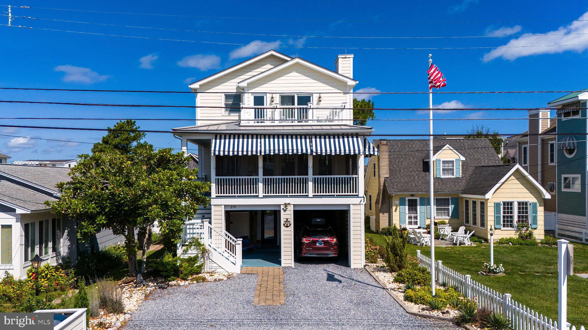 THIS IS THE ONE! 
FULLY FURNISHED, EXQUISITE COASTAL HOME Just 2 Blocks to the Beach, Resturants, Shopping, and the Boardwalk in the Town of Bethany Beach! This Stunning home built by one of the areas elite builders, Mark Dieste Design Build features an open concept floor plan with 7 spacious bedrooms, and 5 Full bathrooms. Just some of the features include random-width pine reclaimed hardwood floors throughout, ceramic tile in all bathrooms, granite countertops, stainless steel appliances, multiple outdoor sanctuaries to include a rooftop deck you won't want to leave, wraparound screened porch, 2 primary bedrooms with ensuite bathrooms, main floor laundry, elevator shaft/owners storage area on every floor, outside shower, extensive ground floor decking perfect for entertaining, outdoor eating, games and so much more... You don't want to miss the opportunity to make this beauty your own!
