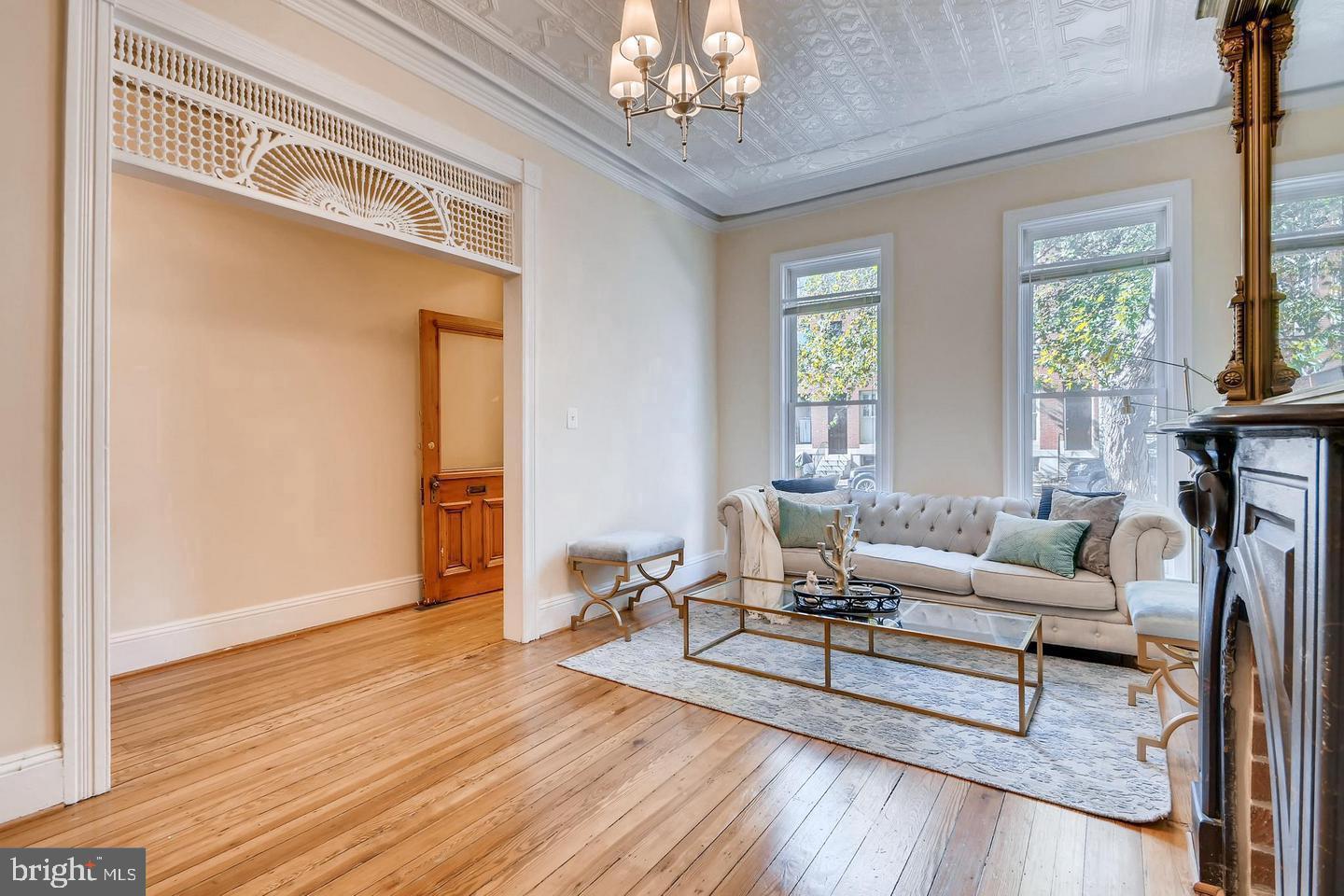 >> TURN KEY EQUITY << Over 3,100 Square Feet of Living Space >>Home Qualifies for 100% Financing & $10,000 in Closing Cost Help << >> NO HOA - Stunning End‑Unit Home Steps From Union Square Park Offering Beautifully Finished Living Space, Fully Renovated In 2019 With Additional Enhancements and New Roof in 2024 - Featuring Tin Ceilings, In‑Lay Hardwoods, Custom Millwork, Updated Architectural Details, A Gourmet Kitchen With Granite Counters And Stainless Steel Appliances, All Within Minutes Of The Marc Train, MTA, University Of Maryland Bio Park, University Of Maryland At Baltimore, Shock Trauma, Convenient Shopping, & Major Routes Including 95 South To DC, Columbia, NSA/Ft. Meade & Annapolis.