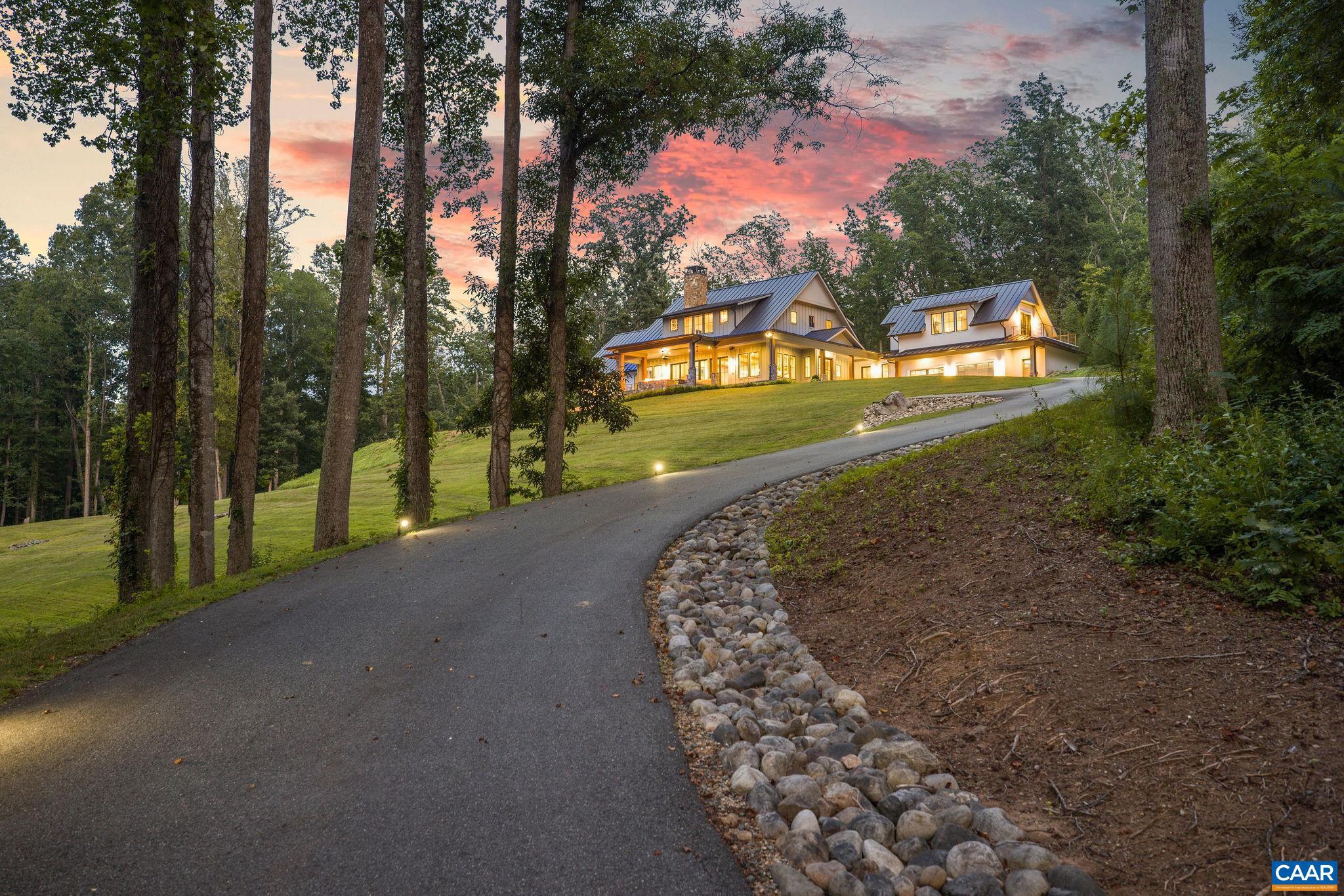 Sweeping Blue Ridge Views and Exceptional Design. A rare offering in Charlottesville?s premier Colthurst Farm neighborhood minutes from UVA, Historic Downtown and two Country Clubs. Set on 6+ private acres with just under 8,000 sf of living space and 1,700+ sf of outdoor porches and terraces, this custom-built estate captures sweeping Blue Ridge Mountain views from nearly every room. Thoughtfully designed for luxurious everyday living and grand entertaining the home features soaring ceilings, a breathtaking great room with wood burning fireplace and a chef?s kitchen with 6 burner Wolf range and Sub-Zero appliances and wine fridge. The main-level primary suite is a tranquil retreat with spa-like amenities and a huge closet with custom shelving. Additional highlights include a home office, library with gas fireplace and built-ins, a second primary suite upstairs, two ensuite bedrooms and a private guest suite/office wing. The terrace level offers a full gym, home theater, rec room with wet bar and guest suite. Outside, enjoy a covered terrace with built in gas firepit, heated saltwater pool with state-of-the-art automation, private terrace with jacuzzi hot tub and an outdoor shower. A stunning blend of privacy, elegance and views.,Quartz Counter,Wood Cabinets,Fireplace in Great Room,Fireplace in Study/Library