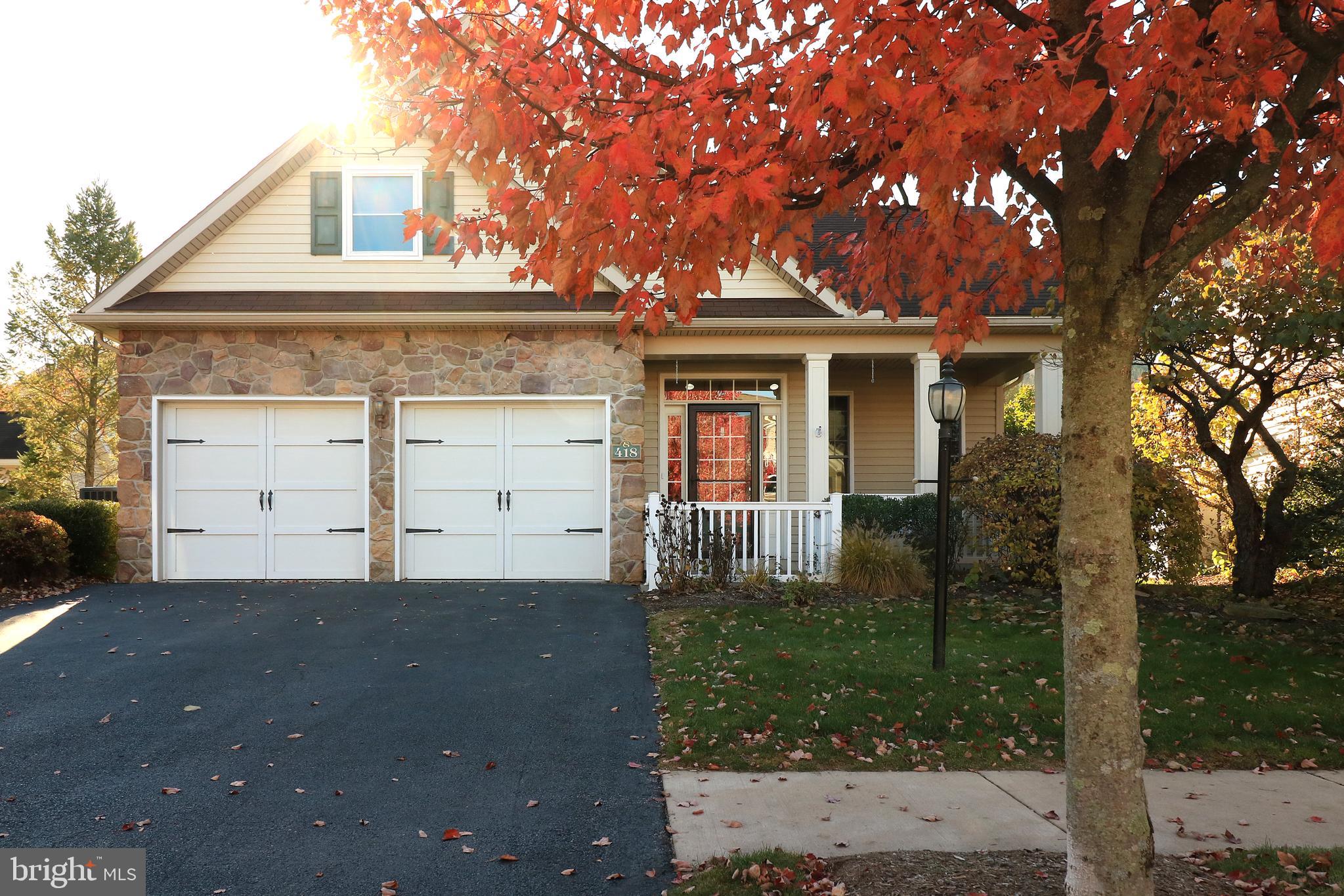 Welcome Home to 418 Homestead Lane, a one-owner property, located in the desirable Springfield Commons. If you love natural light, you will love this move-in-ready home! The property features an open great room with soaring ceilings, an abundance of natural light, and Engineered Hardwood Floors. There is also a majestic propane fireplace to warm your toes on those chilly PA evenings. On your way to the kitchen, make sure to stop by the enclosed 3 seasons sun porch outfitted with interior and exterior "Doggy/Kitty" doors for easy access to and from for your four-legged friends!  The sun porch also makes a great place for plant parents, providing lots of space for a variety of  Flora. The cozy kitchen sparkles with granite countertops, under-cabinet lighting, and Stainless Steel Appliances. For your convenience, the laundry is located on the main floor, along with two bedrooms and two bathrooms. In the sprawling primary owner space you will find brand-new carpeting, tray ceilings,  an ensuite bath, a walk-in closet, and an attached sitting area.   Ascending the stairs to the second story, which was added by the current owners, there are beautiful hardwood floors throughout, two additional bedrooms with skylights, and access to storage in the eaves.  To round out the tour, there is a Jack and Jill bathroom, with a half bath for each second-floor bedroom with sun tubes, and a shared shower space in the middle.  
Springfield Commons was designed to foster a strong community with pedestrian-friendly sidewalks, walking paths, front porches, and a "Tot Lot"/Playground.  The monthly HOA also provides you access to the Community center outfitted with a full kitchen, social room, and fitness facility.  
Live where you work, work where you live, this home is located minutes from local eateries, and shopping, located a stone's throw away from the University making commuting a breeze. The property is being sold AS-IS.  Seller offering $10,000 credit with accepted offer.