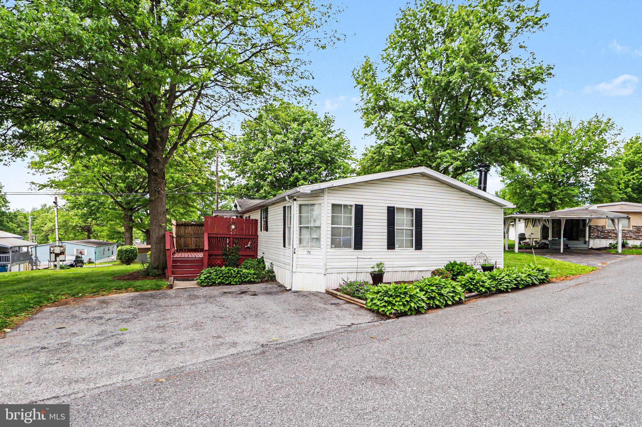 Welcome to this 3-bedroom, 2-bath mobile home in Little Hollywood Mobile Home Park in Middletown, offering 1,792 sq. ft. of comfortable living space and an unbeatable combination of style, space, and affordability. Enjoy low-maintenance living with a monthly lot rent of just $465, which includes water, sewer, trash, and snow removal.
Step inside to find a bright and inviting open-concept layout designed for everyday living and entertaining. The spacious kitchen features vaulted ceilings, a breakfast area, breakfast bar, gas range, and seamless flow into the cozy family room with a fireplace. A separate formal living room welcomes you at the entrance, providing additional space to relax or entertain.
The home offers three generously sized bedrooms with ample closet space, including a private primary suite with a full bath. A separate laundry room adds convenience to daily living.
Outside, unwind on the private deck complete with a privacy wall, perfect for relaxing or enjoying quiet evenings. Additional highlights include a large storage shed for extra storage needs and a paved driveway with two dedicated off-street parking spaces.
This home is just minutes from shopping, dining, schools, and major highways including I-83 and Route 283, making commuting a breeze.