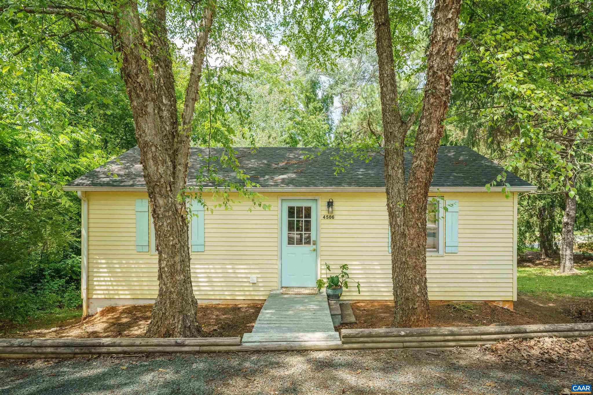 The location of this cottage sings ? peaceful outdoor space without sacrificing convenience! Relish the confluence of Crozet, Charlottesville, and Waynesboro cultures all with verdant outdoor spaces and a quiet street. Fully renovated in 2022 and freshly painted in 2026, this cottage is move-in ready on a quiet half-acre corner lot in Crozet. Refinished hardwood floors run throughout, complemented by butcher block counters, and a light-filled  office off the  primary bedroom. Enjoy the deck space which is positioned perfectly for entertaining and winter mountain views - and off-street parking rounds out the package! There's lots of potential for future expansion and the outdoor space has limitless potential. This home is ready for it's next chapter!