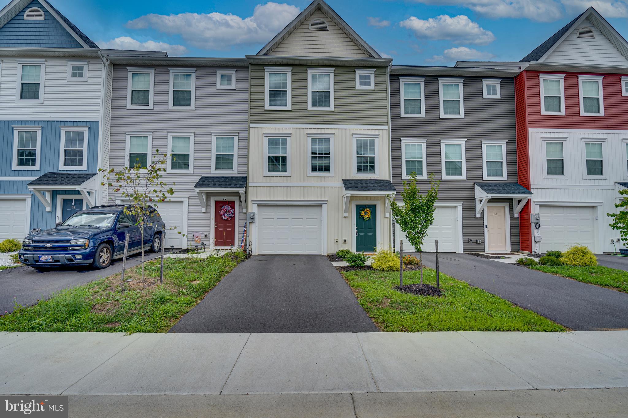 Welcome to your new home in the desirable Bridle Creek subdivision! This stunning 3-bedroom, 2.5-bath interior townhome offers a perfect blend of comfort, style, and convenience. Step inside to find a spacious living area featuring beautiful Luxury Vinyl Plank (LVP) flooring and plush carpeting throughout the upper level, accentuated by high ceilings and recessed lighting that creates an open and airy feel.
The heart of this home is the modern kitchen, complete with sleek granite countertops and ample cabinet space, perfect for culinary enthusiasts. The open-concept layout seamlessly connects the kitchen to the living and dining areas, making it ideal for entertaining.
Upstairs, the primary bedroom is a true retreat, boasting a large walk-in closet and a luxurious ensuite bath with double vanities, providing plenty of space for your daily routine. Two additional well-appointed bedrooms and a full bath offer flexibility for family, guests, or a home office.
Step outside to enjoy your morning coffee or host a small BBQ on the back deck, providing a peaceful space to unwind and enjoy the outdoors. With the added convenience of an attached garage and proximity to local amenities, this townhome offers everything you need for comfortable living.
Don't miss the opportunity to make this beautiful Bridle Creek townhome yours! Schedule a showing today!