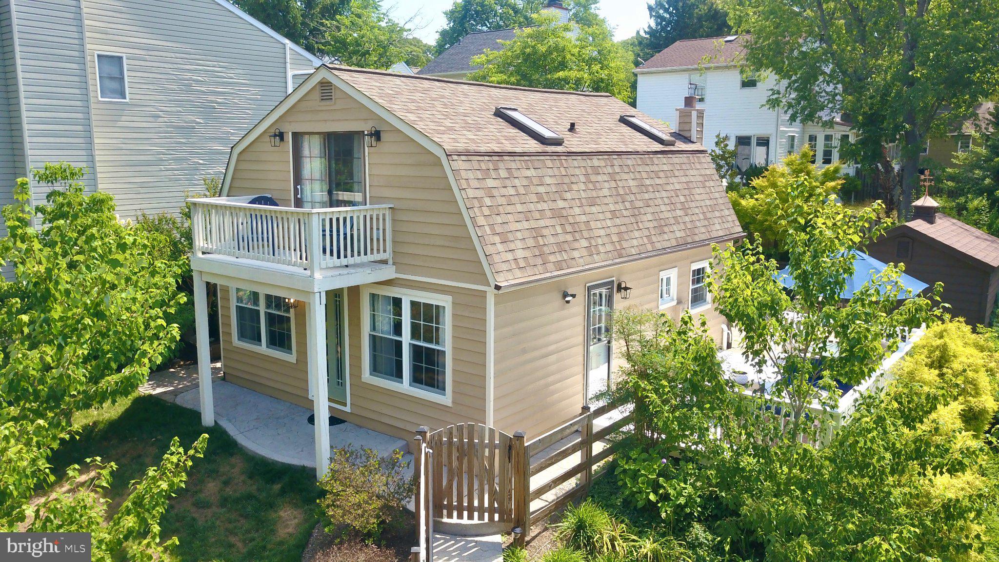 Charming Severna Park cottage in Carrollton Manor, fully renovated in 2023 with an open-concept main level featuring new kitchen, cabinetry, and appliances, plus structural upgrades including new wall studs, insulation, and support beam. Unique architectural details include a spiral staircase, gambrel roofline, and circular stairwell window. A separate laundry room and tankless water heater add everyday practicality.

Upstairs, both bedrooms feature hardwood floors, skylights, private balconies, and ingenious built-in storage throughout. Outdoors, a screened porch overlooks private greenery, a paved patio and large side deck extend the living space, and a versatile shed with electric is ready for use as a studio or workshop. The fully paved, fenced lot includes two off-street parking spots which is a coveted bonus in this community. Additionally, the major systems are updated. The roof was replaced in 2021 and the new HVAC system was installed summer 2025. 

Carrollton Manor is one of Severna Park's most sought-after waterfront communities, offering resident access to three riverfront properties including Sunset Beach, with incredible views of the sun setting over the Severn River, plus a marina and kayak storage through the CMIA. All of this, just minutes from Severna Park's great shops and dining.

*Professional photos will be uploaded soon.