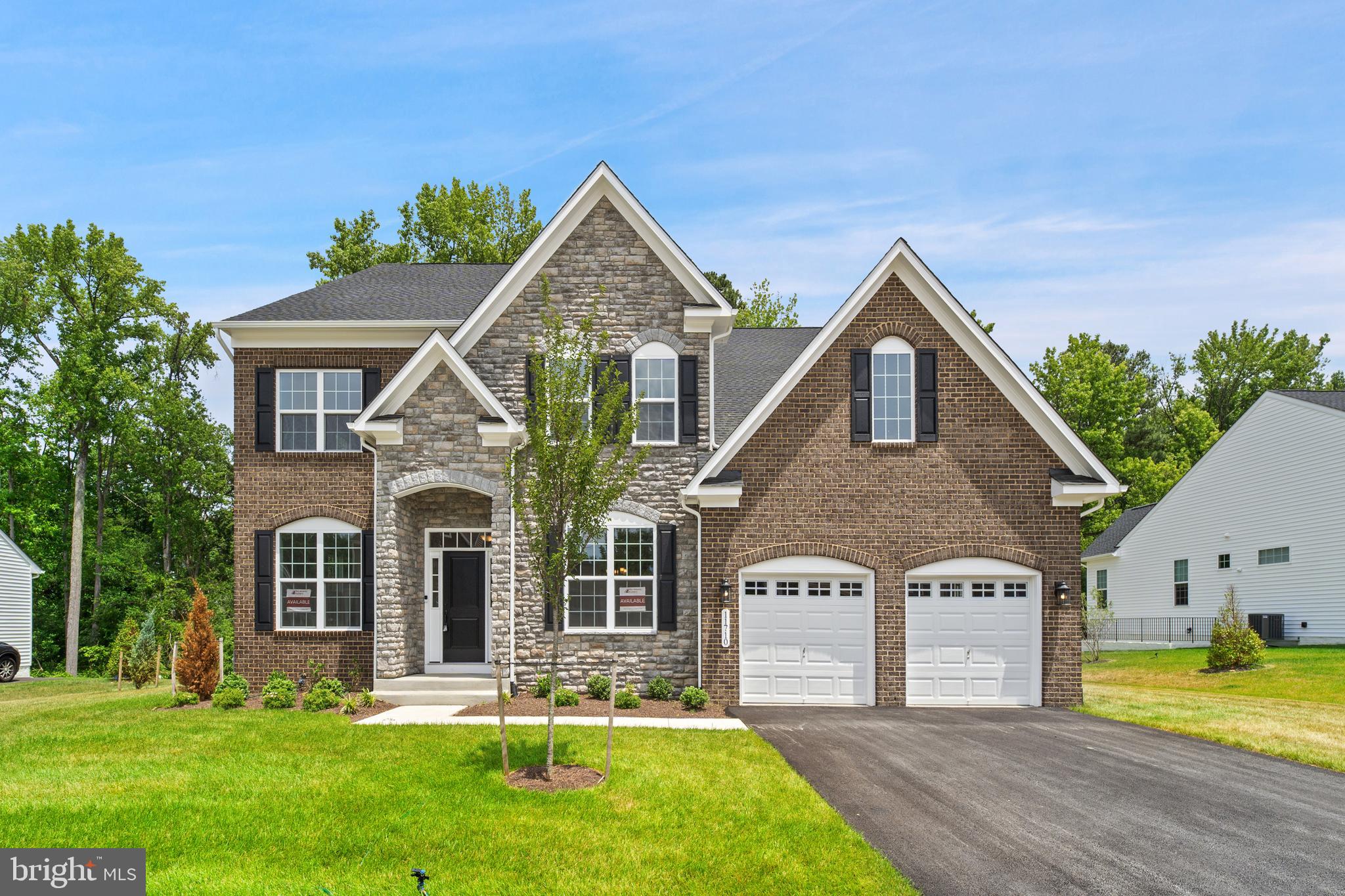 Move-in Ready,  new construction residence in Glenn Dale Estates by Mid-Atlantic Builders.. Encompassing approximately 6,469 square feet, the home offers 6 bedrooms, 5 full baths, and 2 half baths across two gracious levels plus a beautifully finished lower level, creating a sophisticated setting for both grand-scale entertaining and everyday living.

The main level is anchored by a gourmet chef’s kitchen, seamless gathering spaces, and a formal dining room designed for memorable entertaining. The upper level features a sumptuous primary suite with a private sitting room, along with generously sized secondary bedrooms that provide comfort and privacy for family and guests alike. The finished lower level expands the home’s livability with a spacious recreation area, media space, and private guest accommodations.

Set on a 0.46-acre homesite within an exclusive community, this remarkable home combines serene surroundings with exceptional convenience. Residents enjoy access to premier commuter routes, shopping, dining, and the cultural and business centers of Washington, D.C., and Annapolis. Come tour the last quick move-in-ready home in Glenn Dale Estates today.