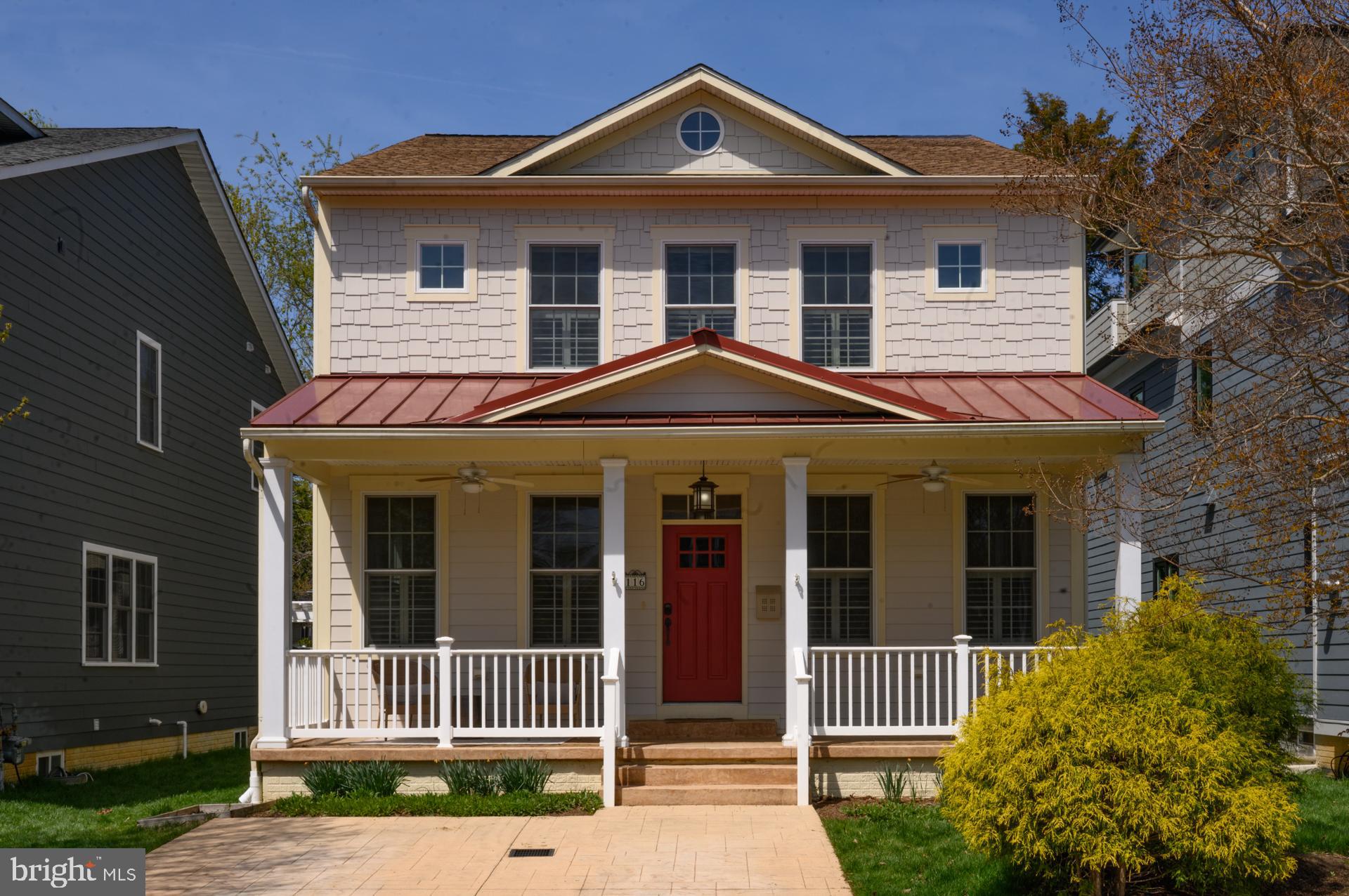 Fresh New Exterior look!  Fresh New Improved price!  Newer Craftsman home located in sought after Murray Hill in the heart of downtown Annapolis. This spacious Craftsman home offers the rare combination of modern construction, architectural character, and true walkable in-town living. Built in 2014, the residence begins with a welcoming front porch and opens into a thoughtfully designed main level featuring high ceilings throughout and coffered ceilings accenting the front living and dining rooms — details that create warmth, scale, and presence rarely found in downtown homes.

The open-concept kitchen flows seamlessly into the expansive family room, where a fireplace anchors the space and elevated ceiling heights enhance light and volume. Just beyond, a three-season sunroom sits behind accordion-style glass doors, offering the flexibility to fully integrate with the main living space or remain a separate seasonal retreat. From here, windows and exterior doors open to the rear yard, creating a graceful transition between interior comfort and outdoor living.

A versatile main-level sitting room or study could potentially be a main level bedroom, with attached full bath, and dedicated laundry room providing flexibility for modern lifestyles. The finished lower level adds valuable living space with a wet bar, full bath, generous storage, and walk-out access — ideal for guests, recreation, or media use.

Upstairs, the spacious primary suite features a walk-in closet and a well-appointed bath with separate soaking tub and shower. Three additional bedrooms complete the upper level, including one en suite and two connected by a Jack-and-Jill bath. With over 3500 square feet of finished living space, the home offers a level of scale and functionality that is far larger than it appears from the street — an exceptional rarity in Murray Hill — along with the added convenience of a two-car off-street parking pad.

Enjoy a short stroll to Amos Garrett Waterside Park, catch a water taxi to City Dock or Eastport, walk to Main Street’s shops and restaurants, or dine under the stars on West Street. This coveted Murray Hill address delivers luxury, space, and lifestyle in one of Annapolis’ most sought-after neighborhood.